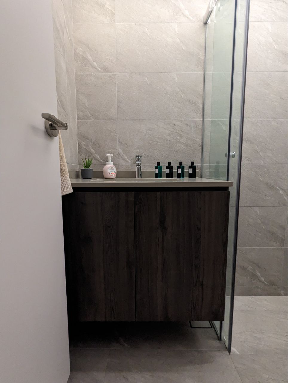 A flush-tastic experience - Dark wood vanity, light gray tiles, modern bathroom, sleek design, minimalist decor, bathroom