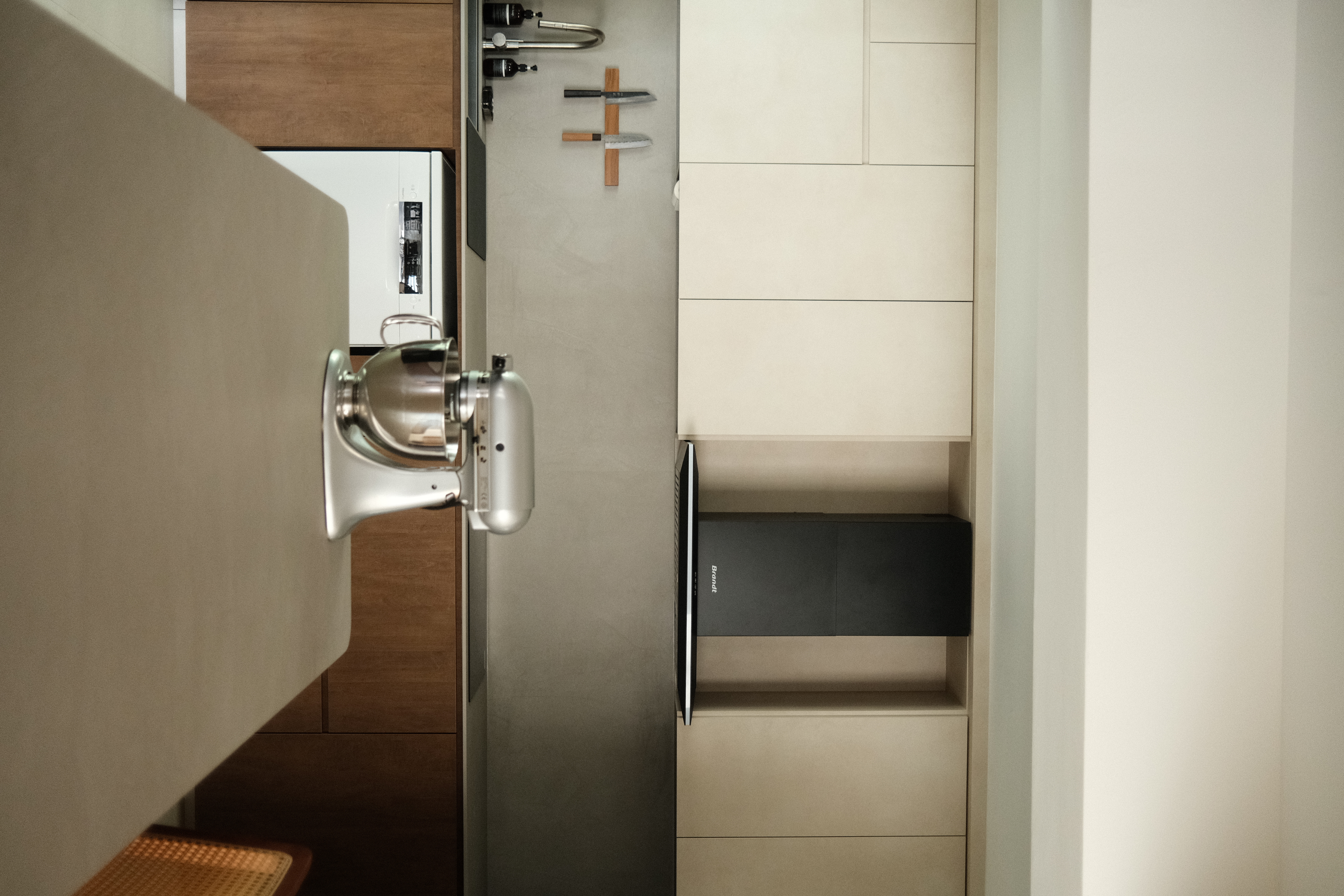 A warm and zen space (Japandi) - Modern kitchen countertop, stainless steel appliance, wooden cabinets, minimalist design