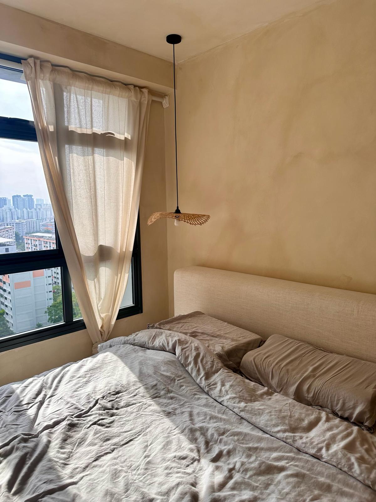 Wabi-Sabi home designed by Chefs to host Private Dinners - Sunlit bedroom with beige walls, modern pendant light, large