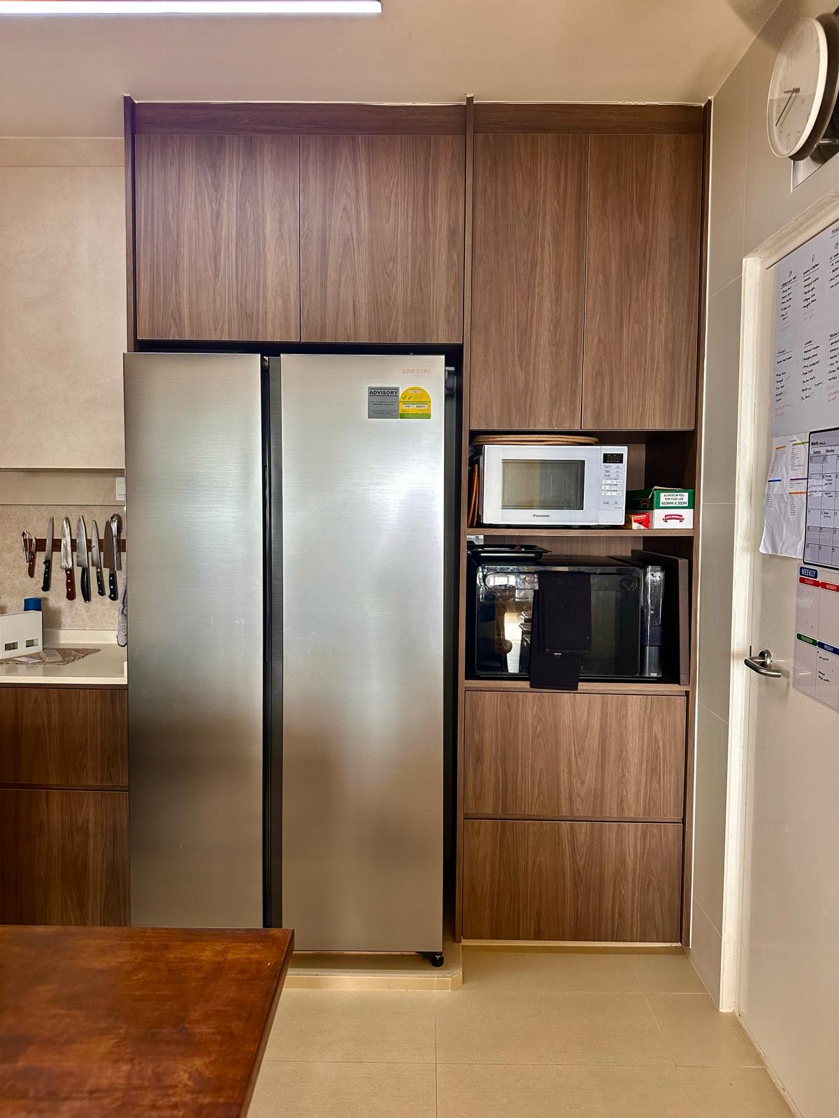 Wabi-Sabi home designed by Chefs to host Private Dinners - Stainless steel refrigerator, wooden cabinets, modern kitchen