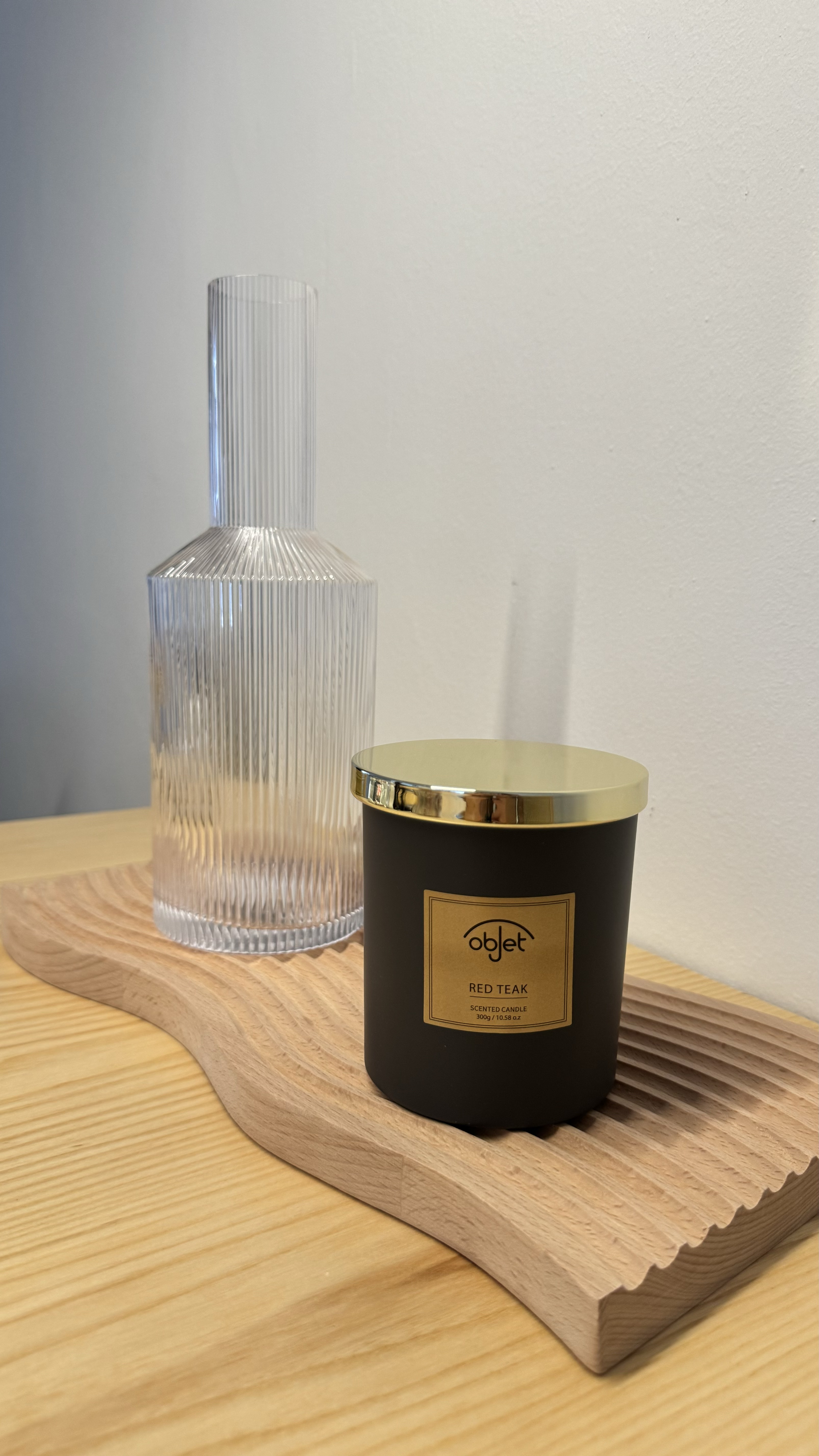 Dine with the tofus! 🍽️🥂 - Clear glass bottle, elegant design, vertical ribbed texture, transparent material, modern