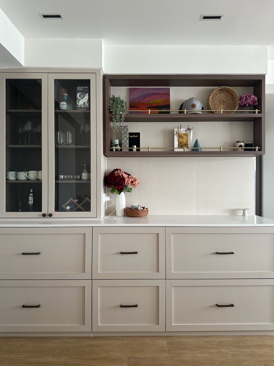 Home Hunt Chronicles: The Resale Route - Glass-fronted cabinet, minimalist design, white and beige color scheme, built-in