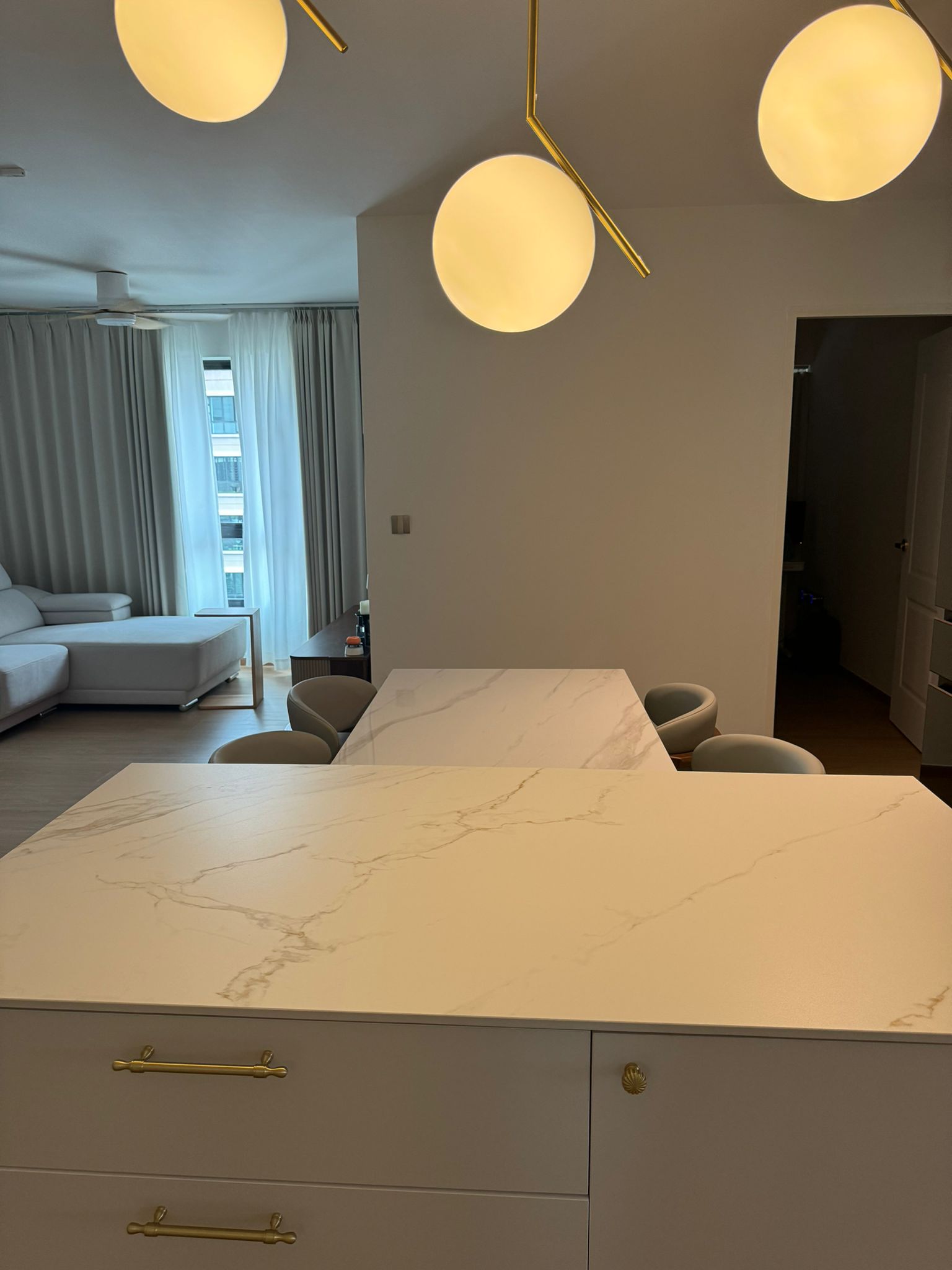 Dining Space: Modern luxury marble dining table connect with island