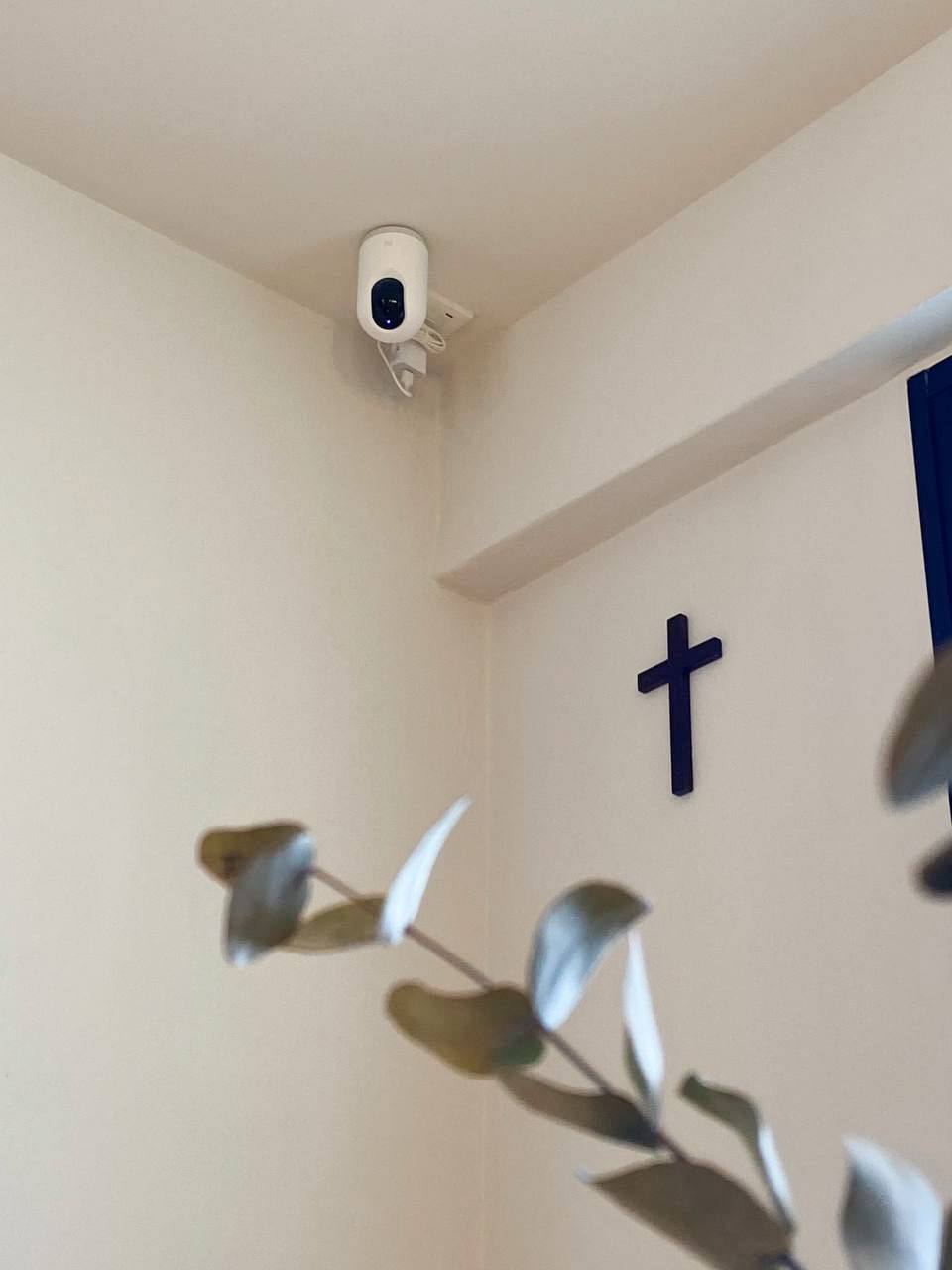 A modern farmhouse dining area - where we come together - Surveillance camera, white security camera, mounted on wall, indoor