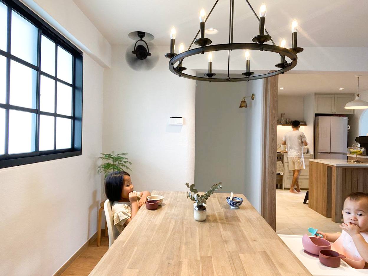 A modern farmhouse dining area - where we come together - Modern kitchen with wooden dining table, children sitting at the