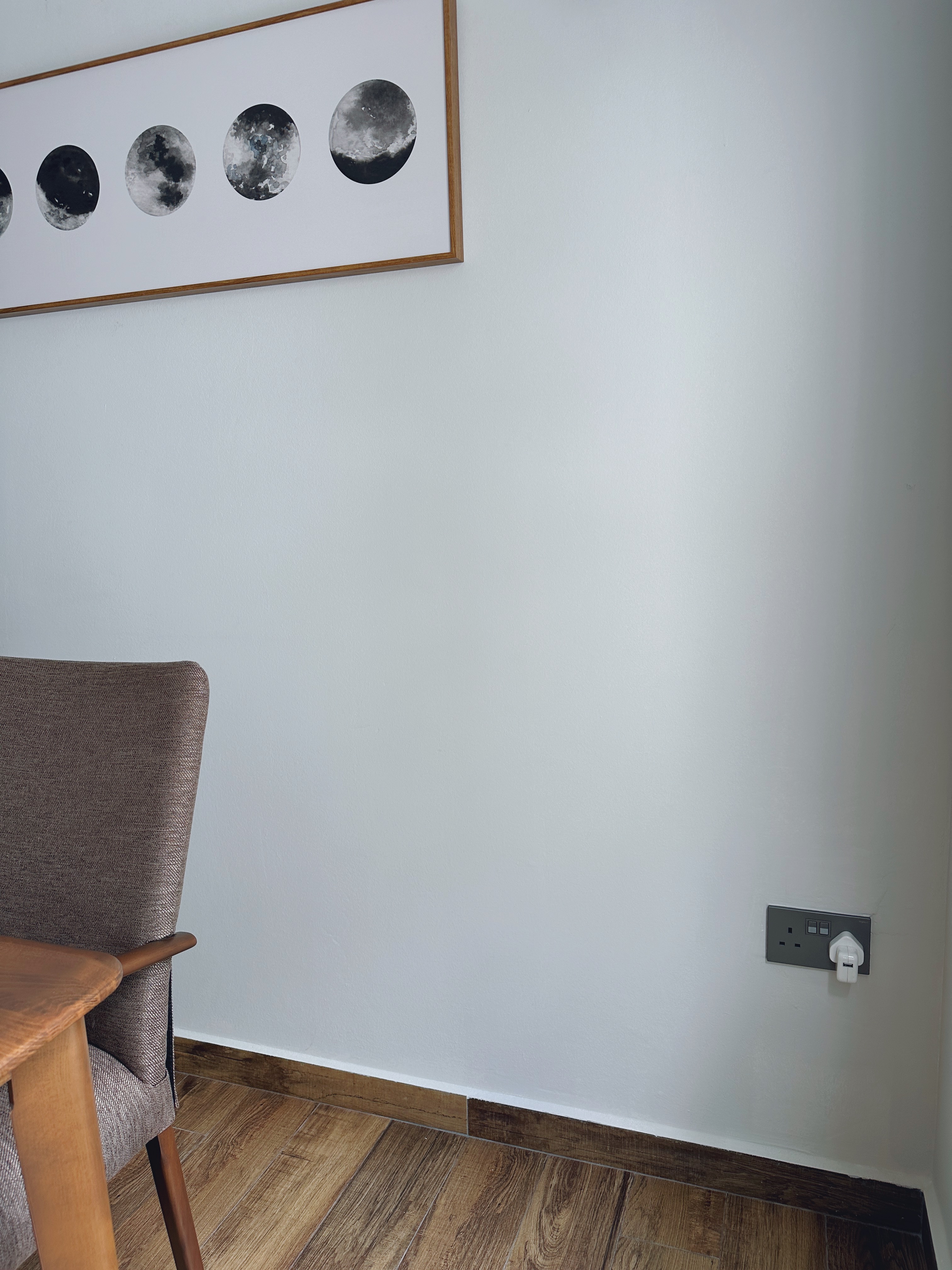 "You can always count on tables to bring people together"  - White wall, minimalist decor, wooden chair, textured upholstery