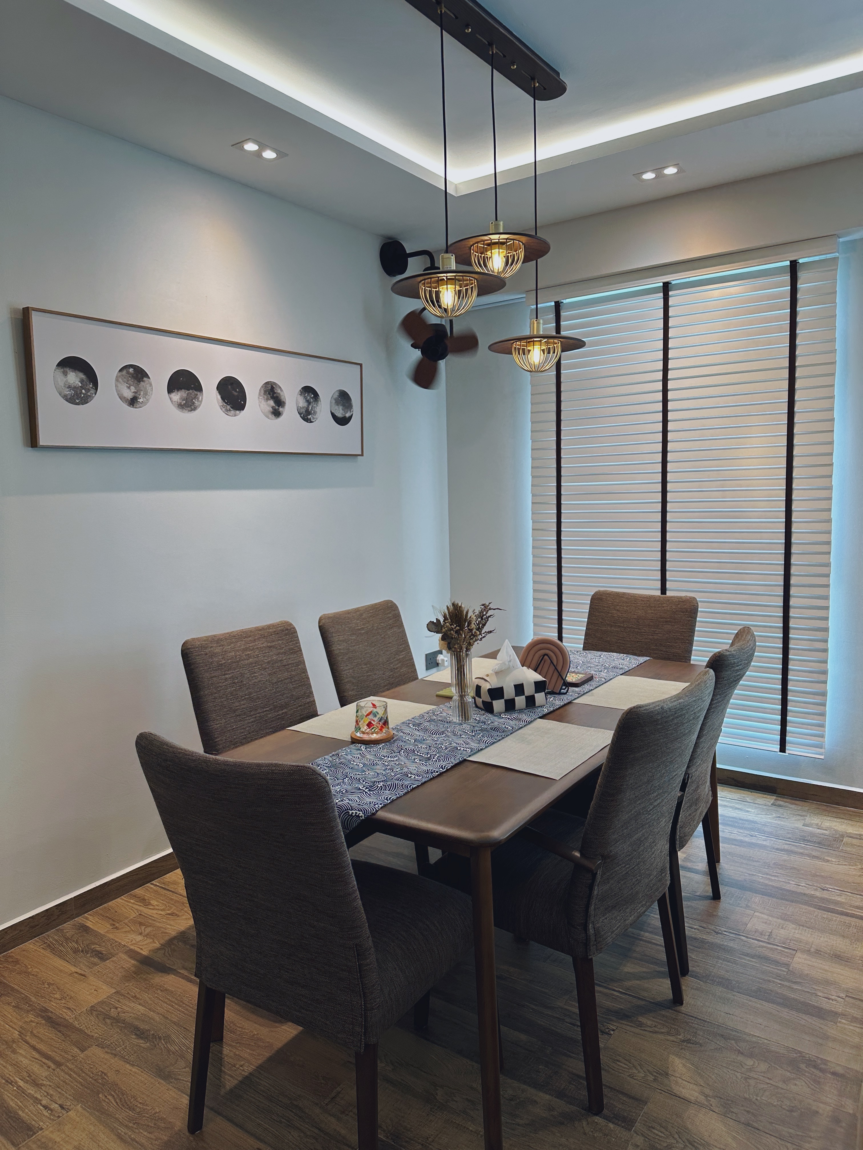 "You can always count on tables to bring people together"  - Modern dining room with sleek design, minimalist decor, wooden