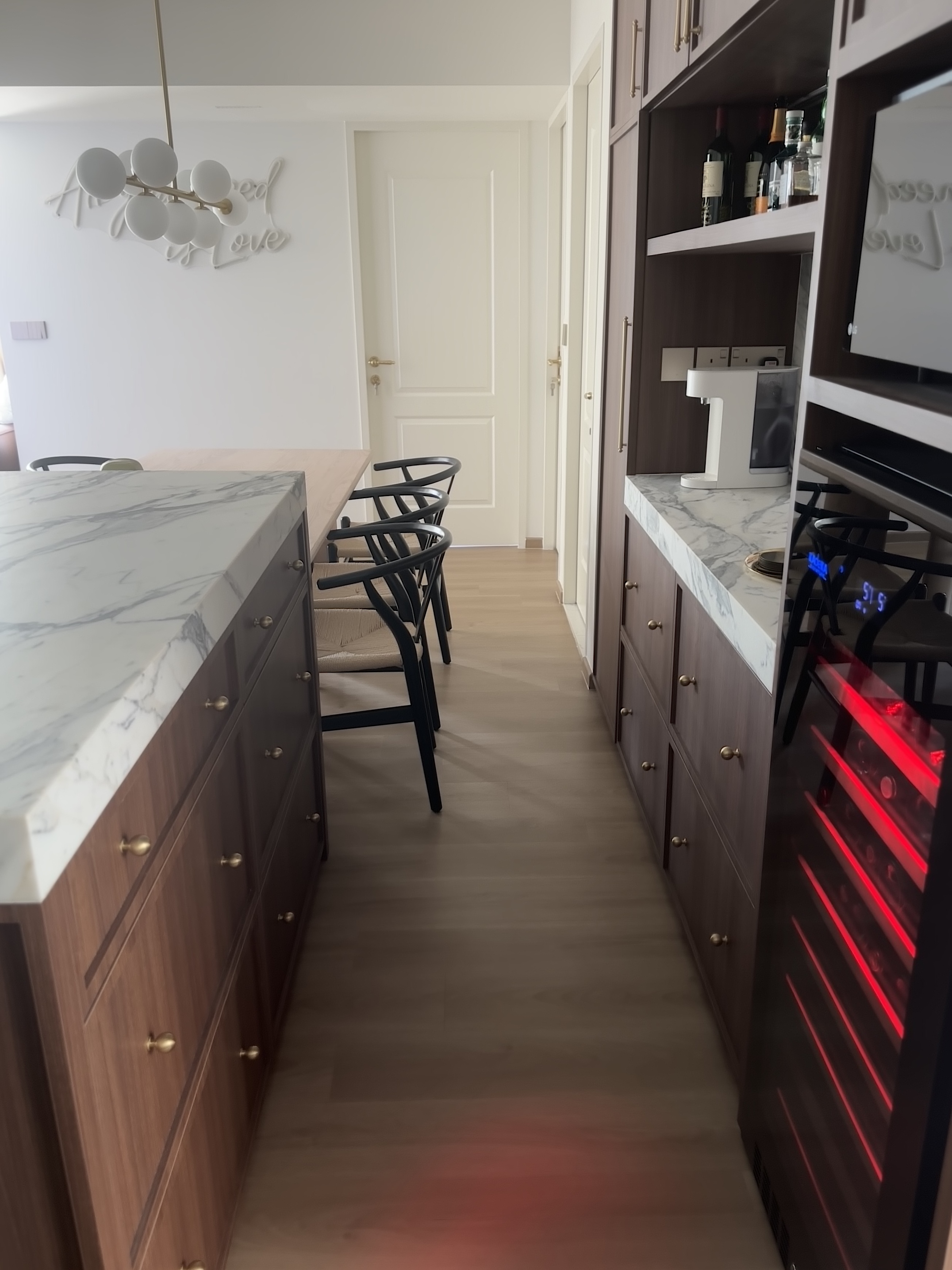 Entertain in Style: Island, Bar, and a 2m Long Dining Table  - Modern kitchen with marble countertops, wooden cabinets with