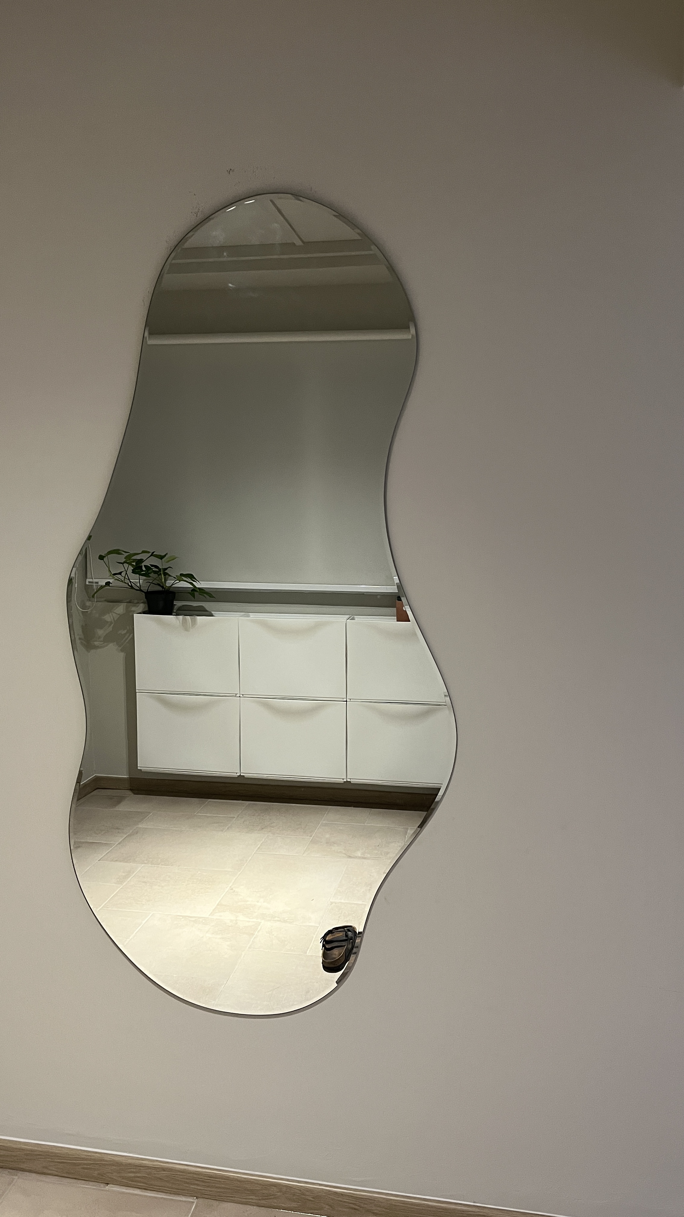 Entryway - Clean & Simple - Mirror, oval shape, white cabinet, tiled floor, indoor setting, modern design, minimalist decor