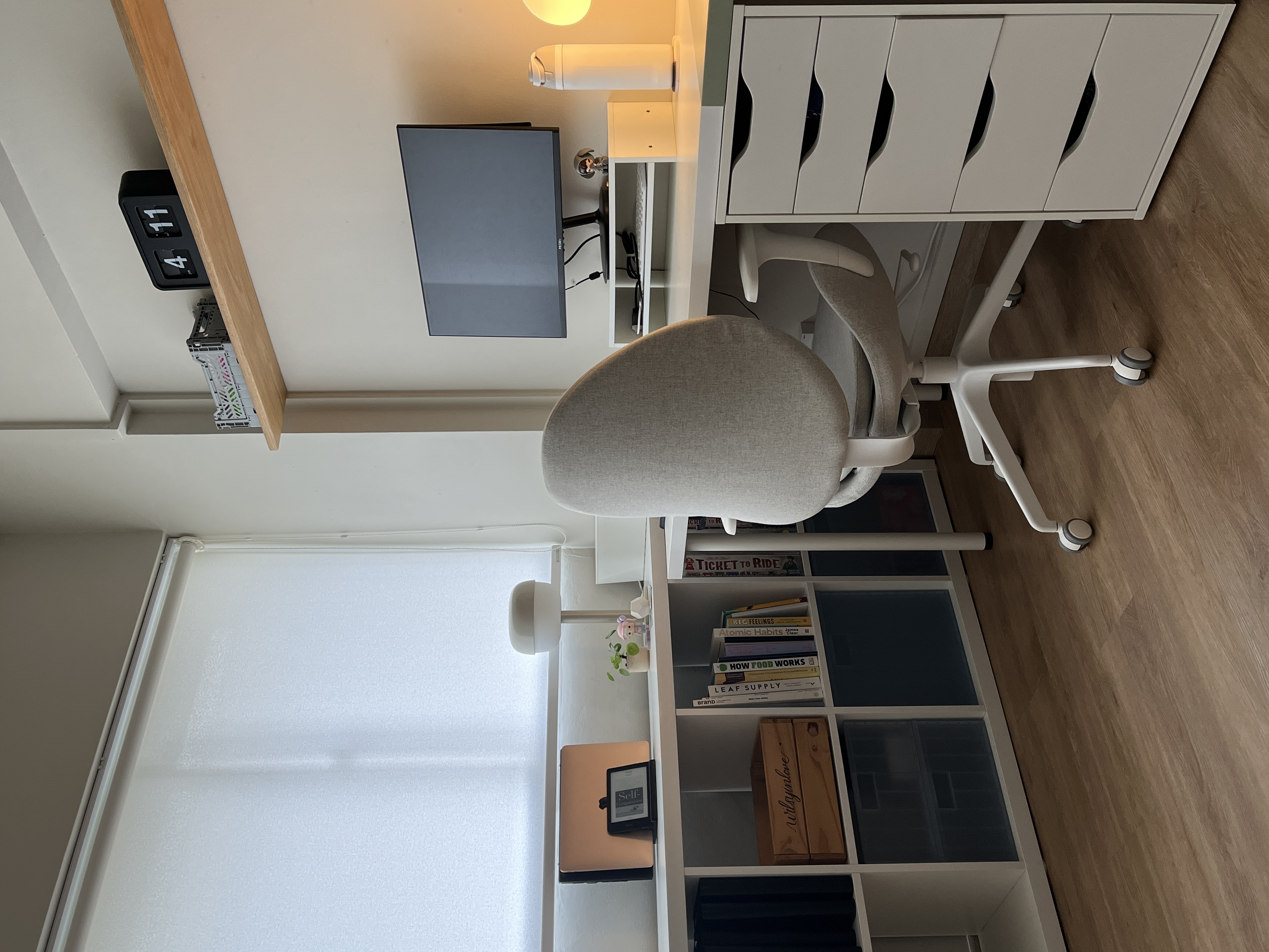 Multi-Functional Space: The Workspace Guest Room - Office desk, ergonomic chair, white shelving, books, desk lamp, natural
