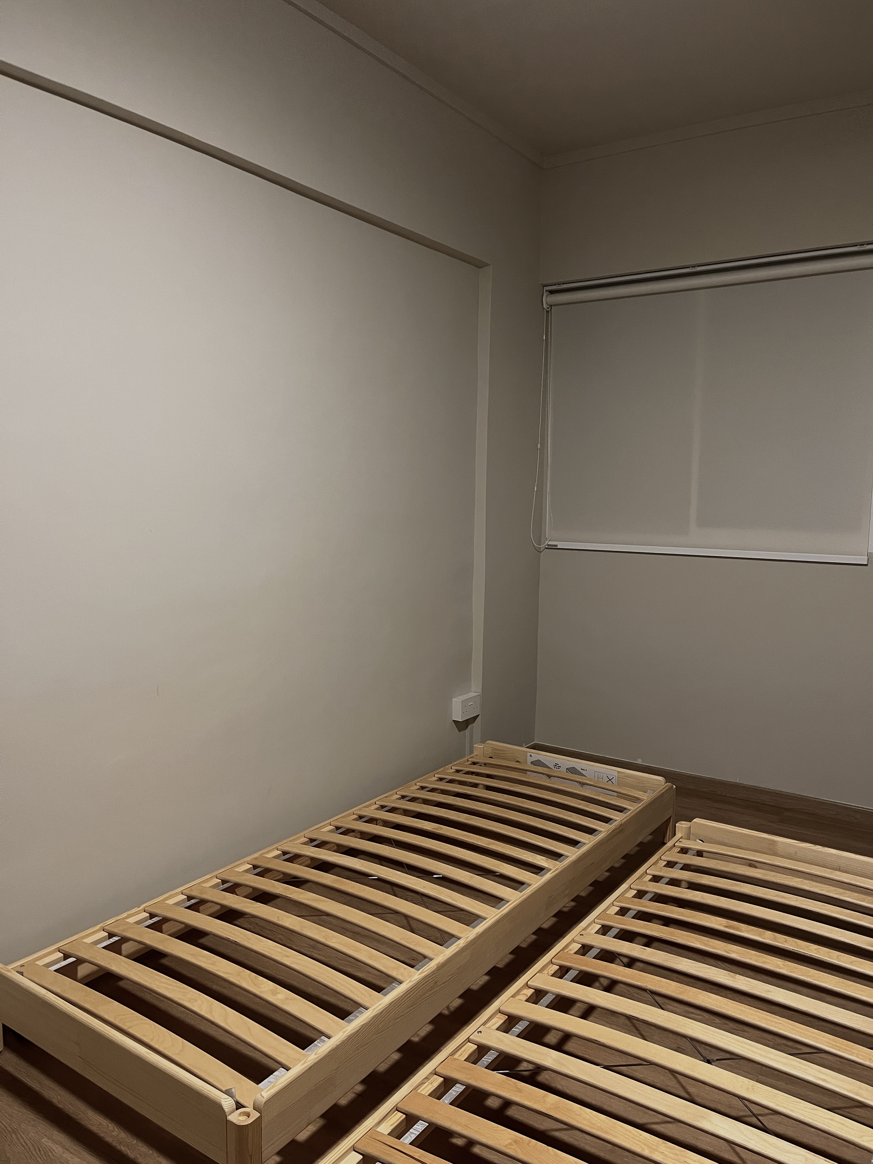 Multi-Functional Space: The Workspace Guest Room - Wooden bunk bed, minimalist design, wooden slats, light wood finish