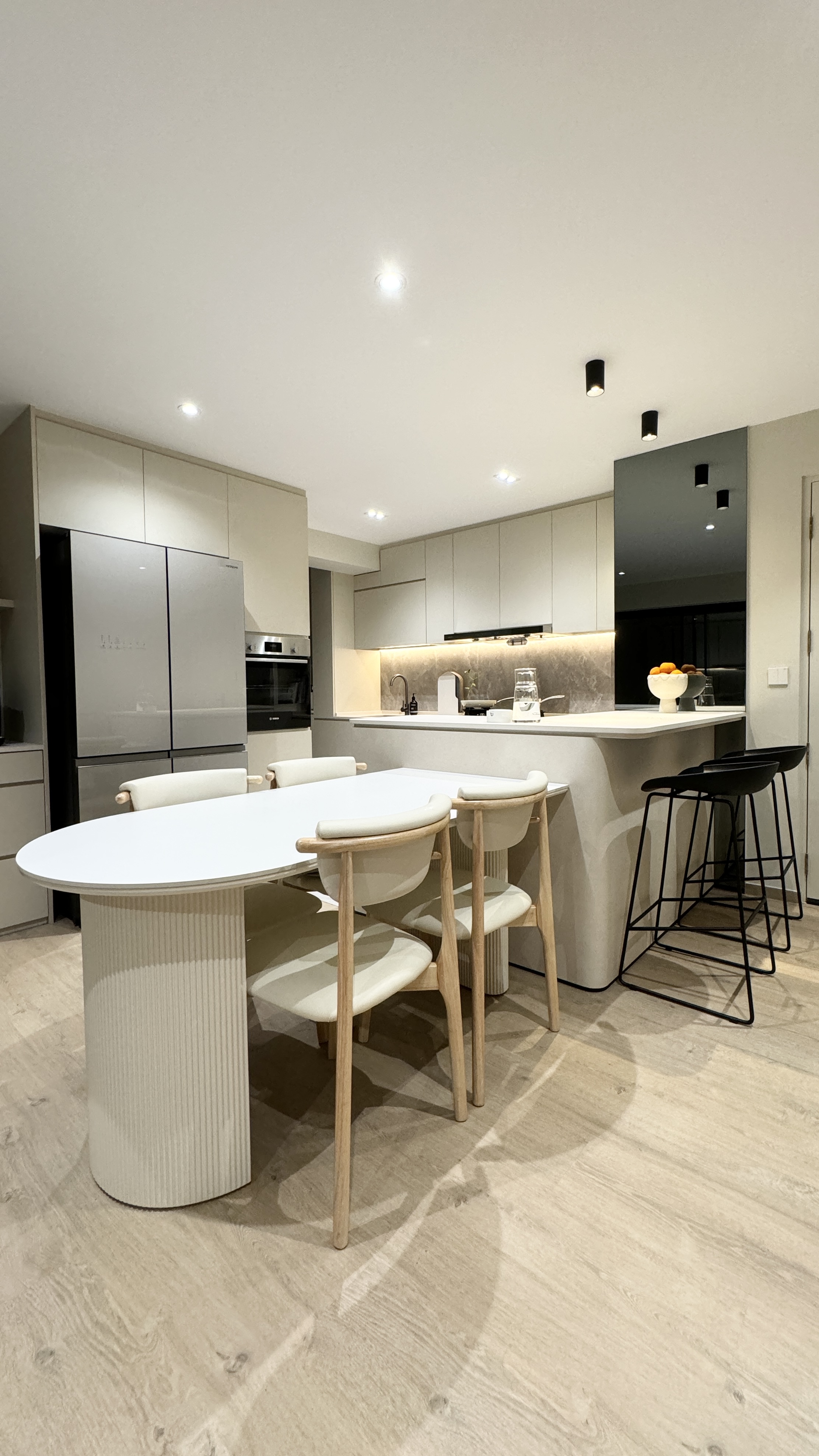 Beyond Meals: Crafting Memories in Dining Room and Kitchen Spaces - Modern kitchen with sleek design, minimalist furniture