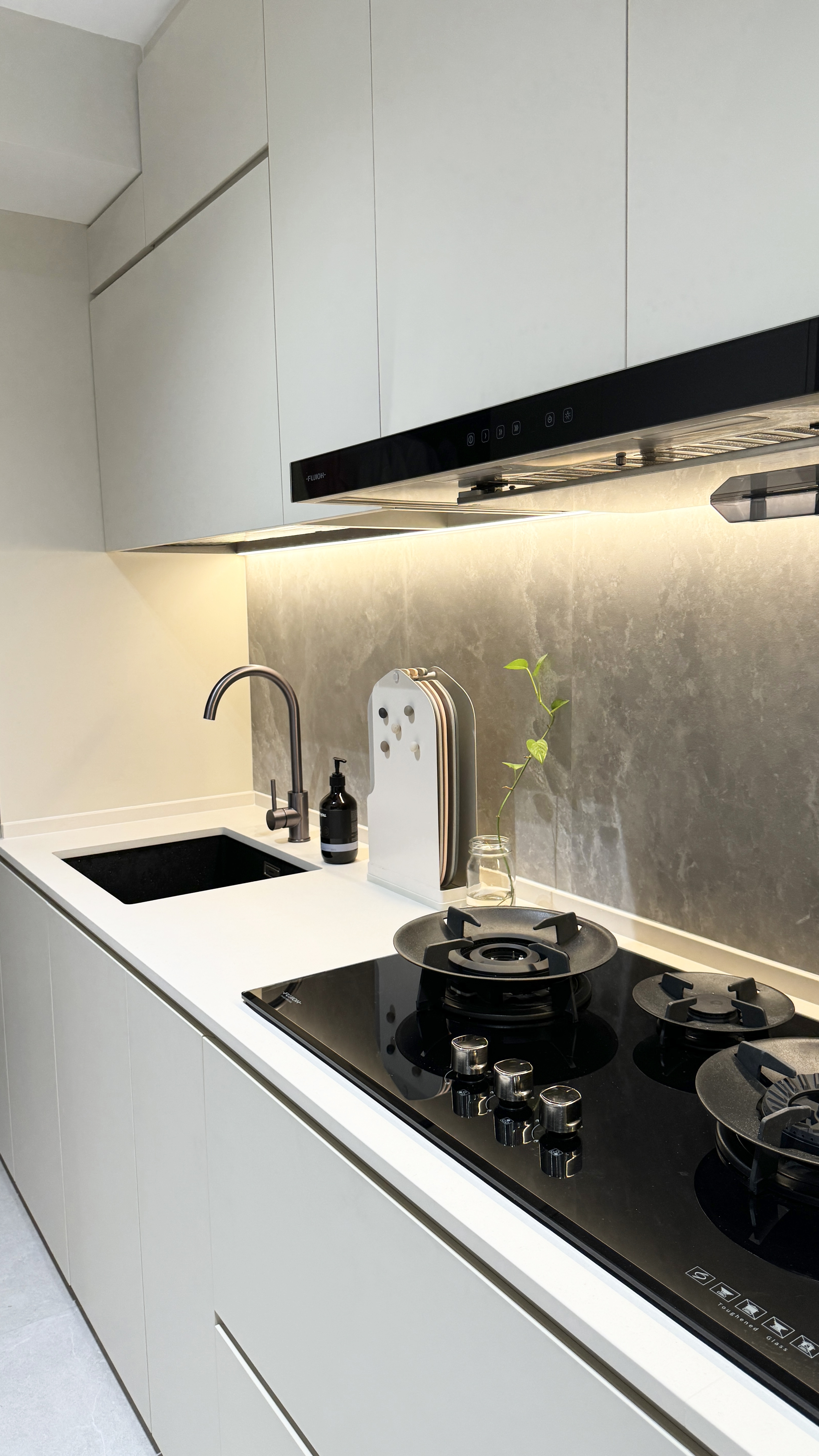 Beyond Meals: Crafting Memories in Dining Room and Kitchen Spaces - White modern kitchen with sleek cabinets, black