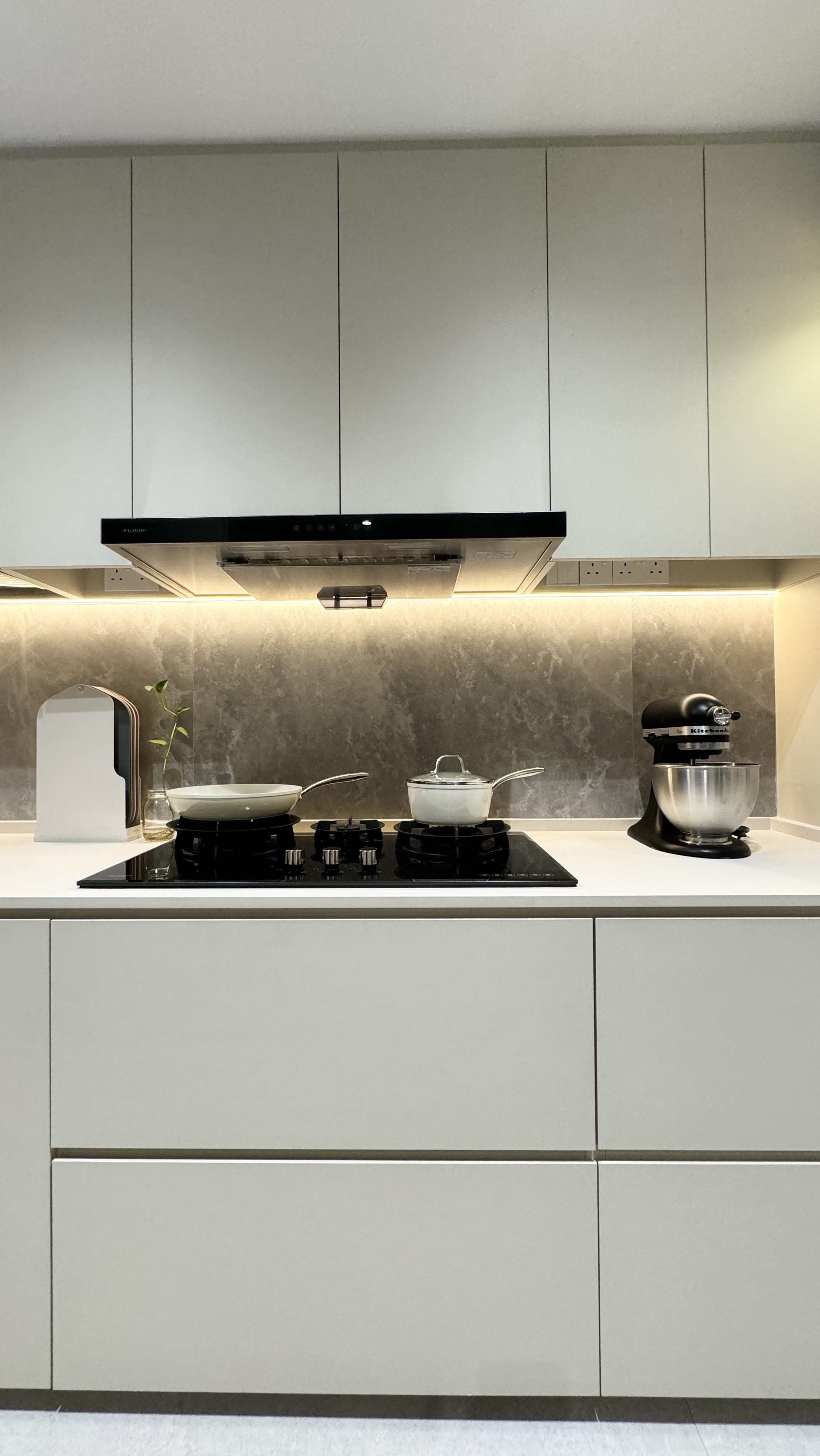 Beyond Meals: Crafting Memories in Dining Room and Kitchen Spaces - modern kitchen, sleek cabinets, gas stove, black range