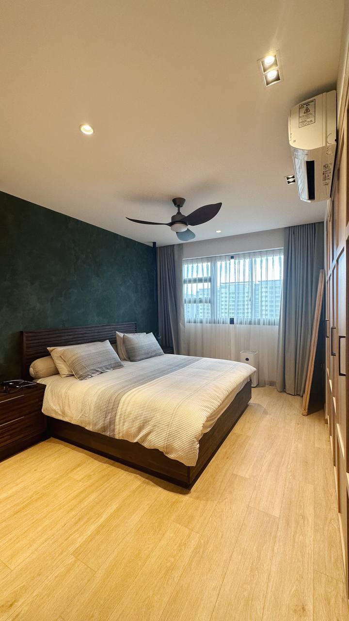 Our Render vs. Reality: 5-Room Resale - Modern bedroom with large bed, dark green accent wall, wooden flooring, ceiling fan