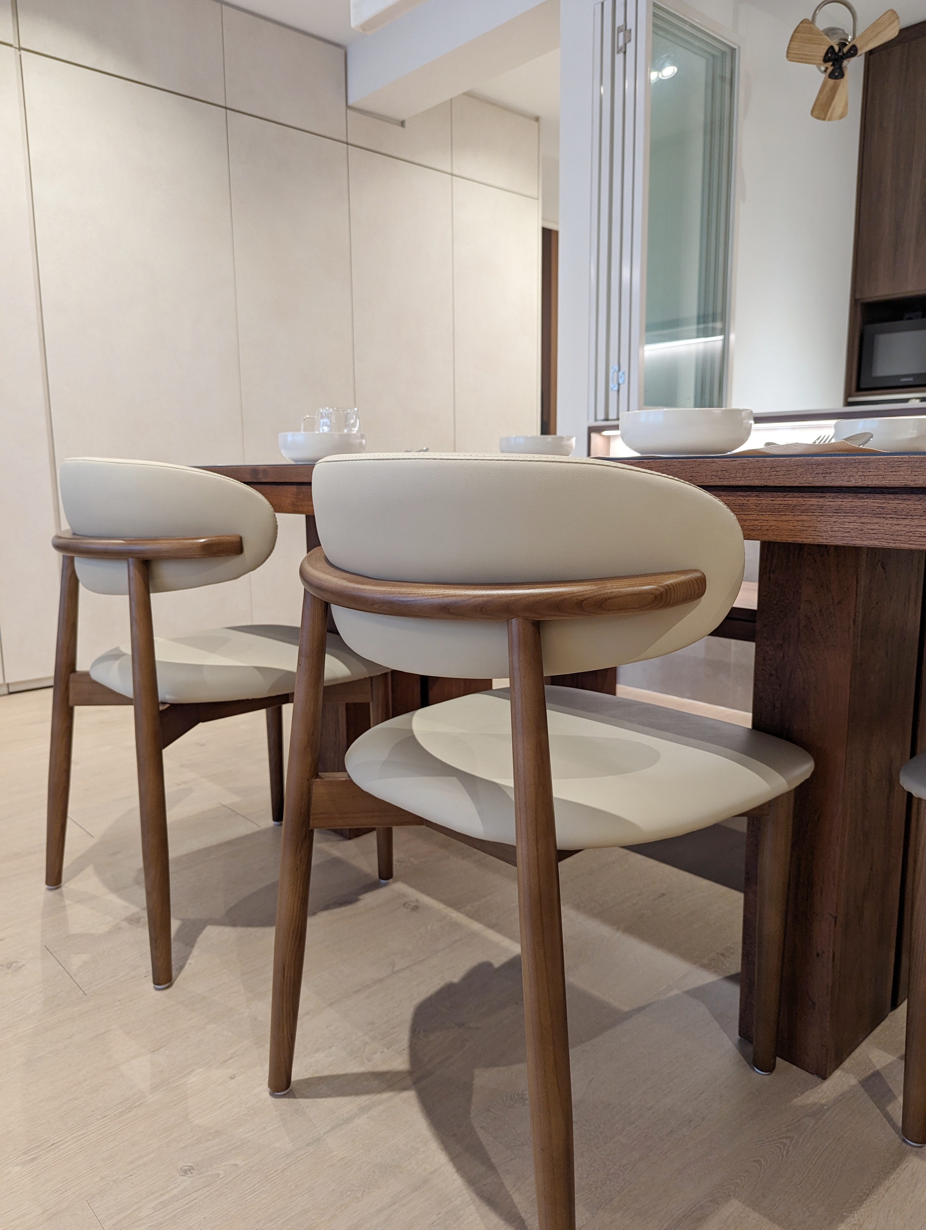 Dining Area: Sharing meals and building connections  - modern dining room, minimalist design, wooden chairs, sleek chairs