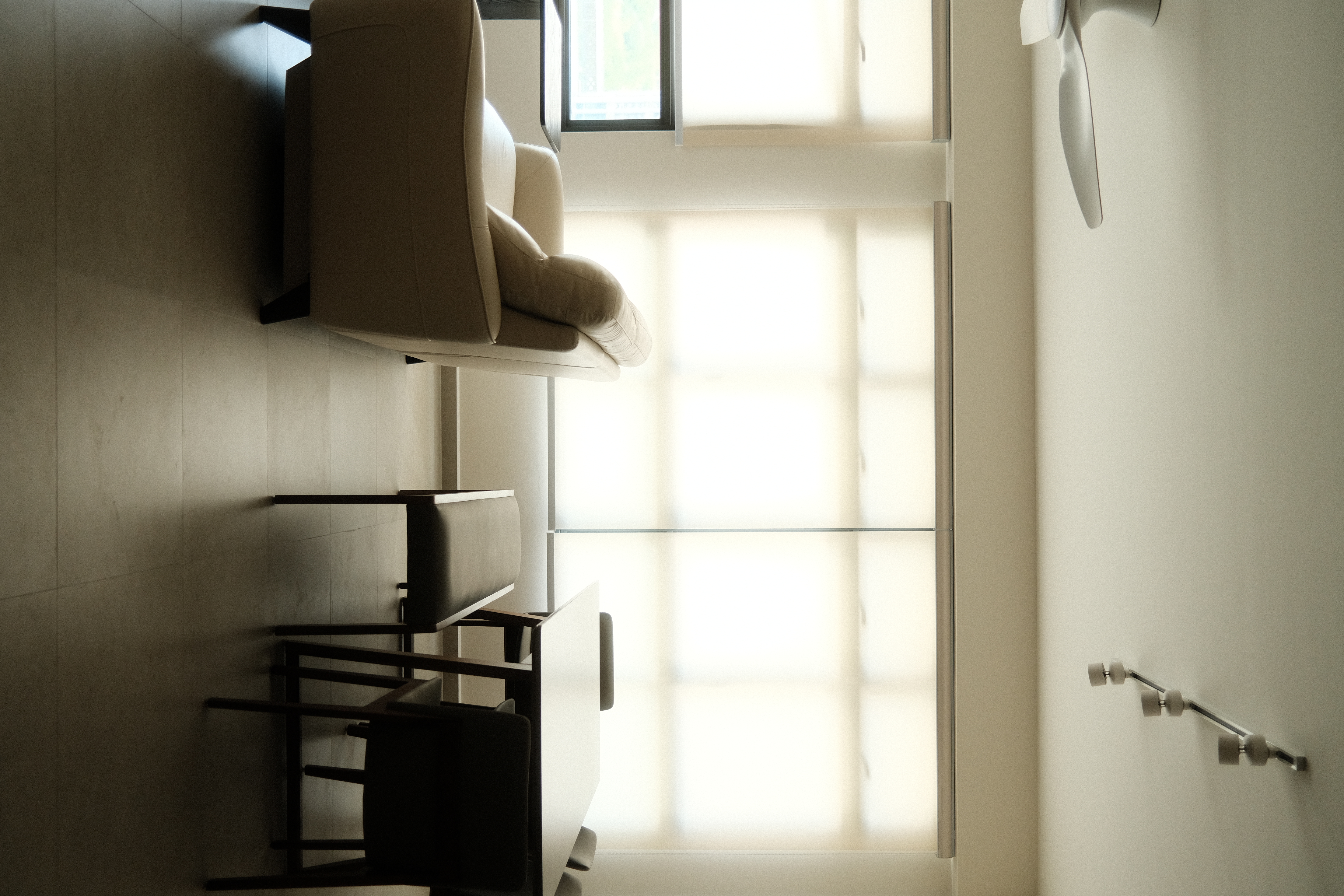 Dining space: Weaving conversations between meals - Modern minimalist interior, soft natural light, large window, beige