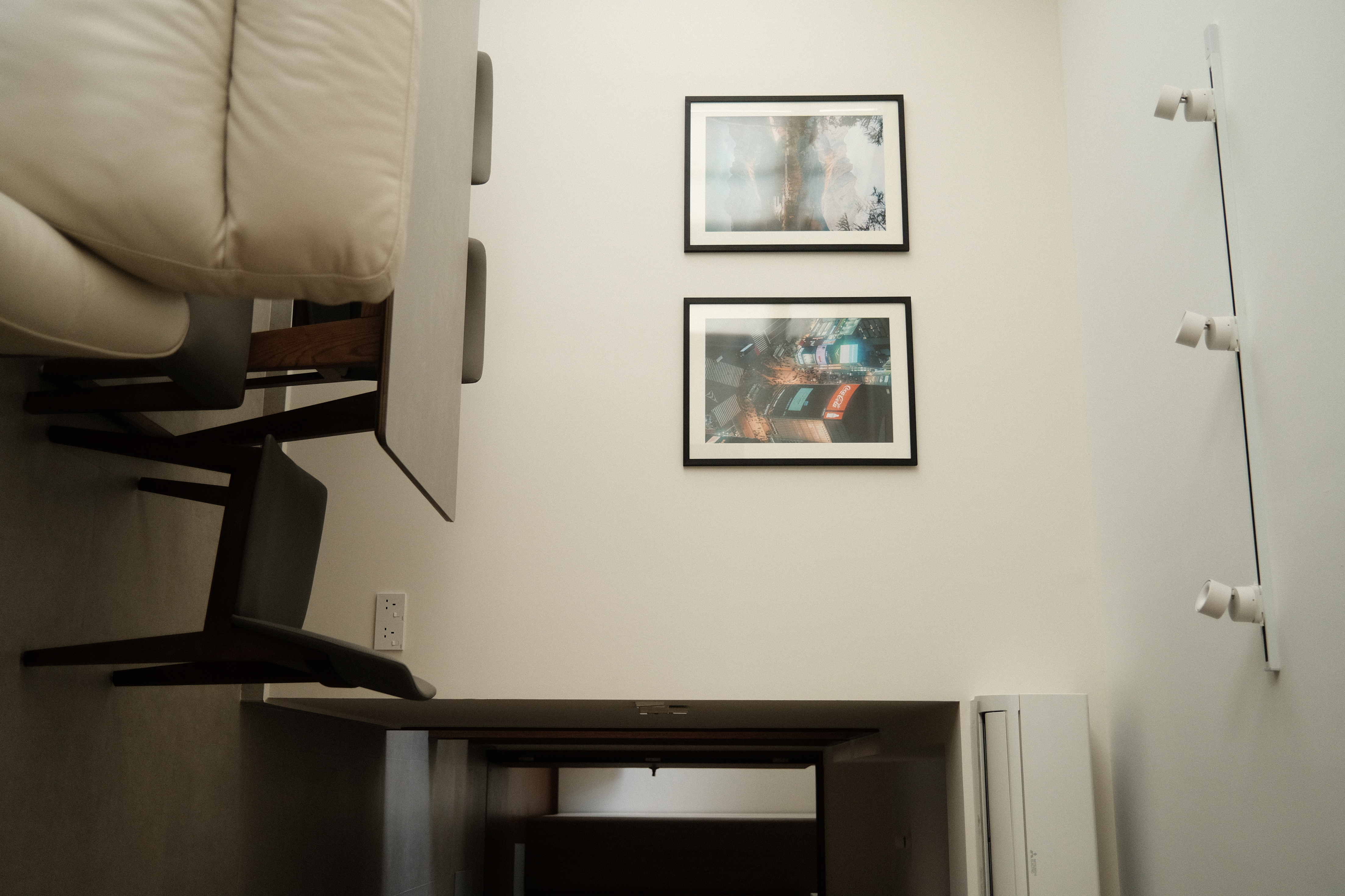 Dining space: Weaving conversations between meals - Leather armchair, minimalist design, modern decor, framed pictures