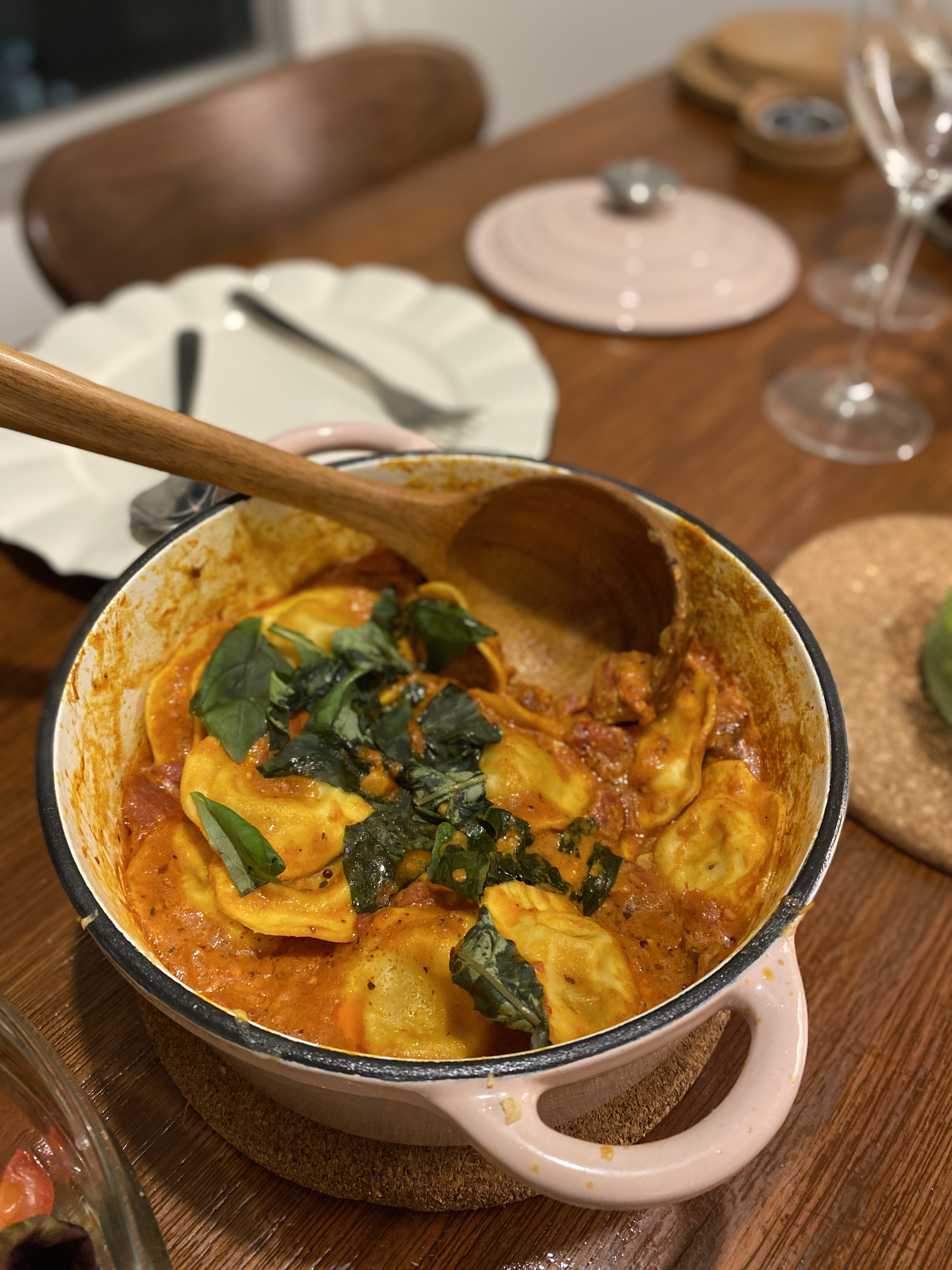 Hearty Meals, Warm Hearts: Our DIY Thrifted Dining Table  - Creamy pasta dish with green leafy vegetables, rustic wooden