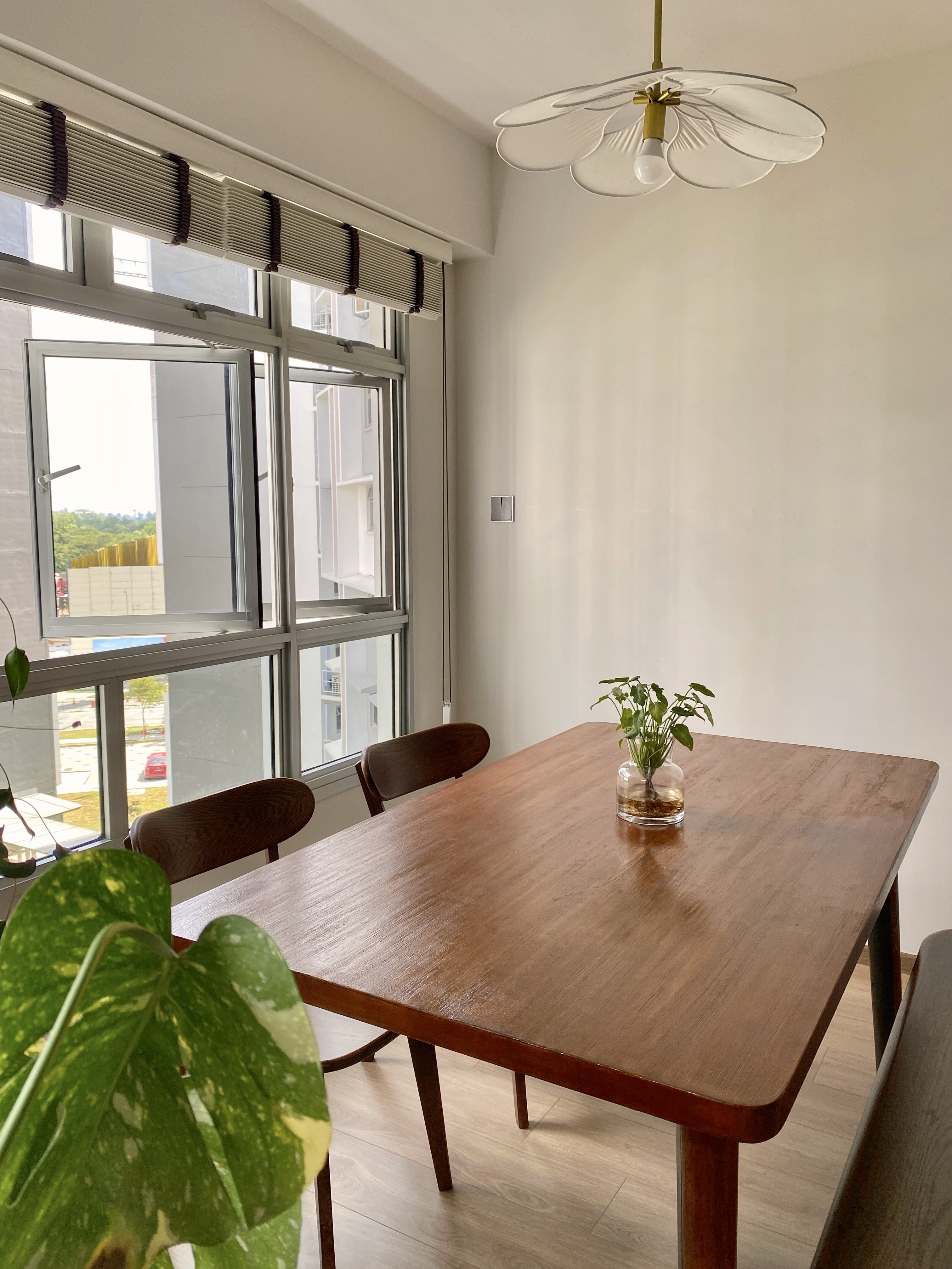 Hearty Meals, Warm Hearts: Our DIY Thrifted Dining Table  - Modern minimalist dining room, large windows, natural light