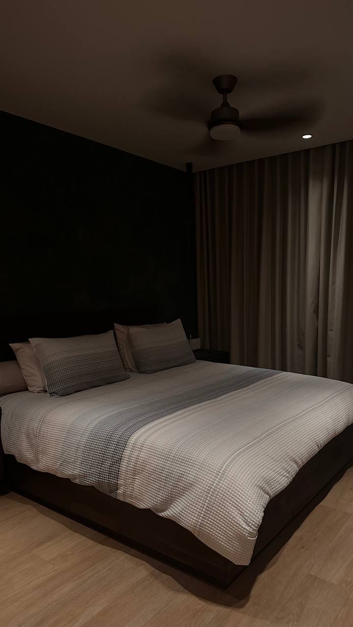 Bedroom Made For A Restful Night 🌙🛏️ - Modern bedroom with neutral color scheme, large bed with gray and white bedding