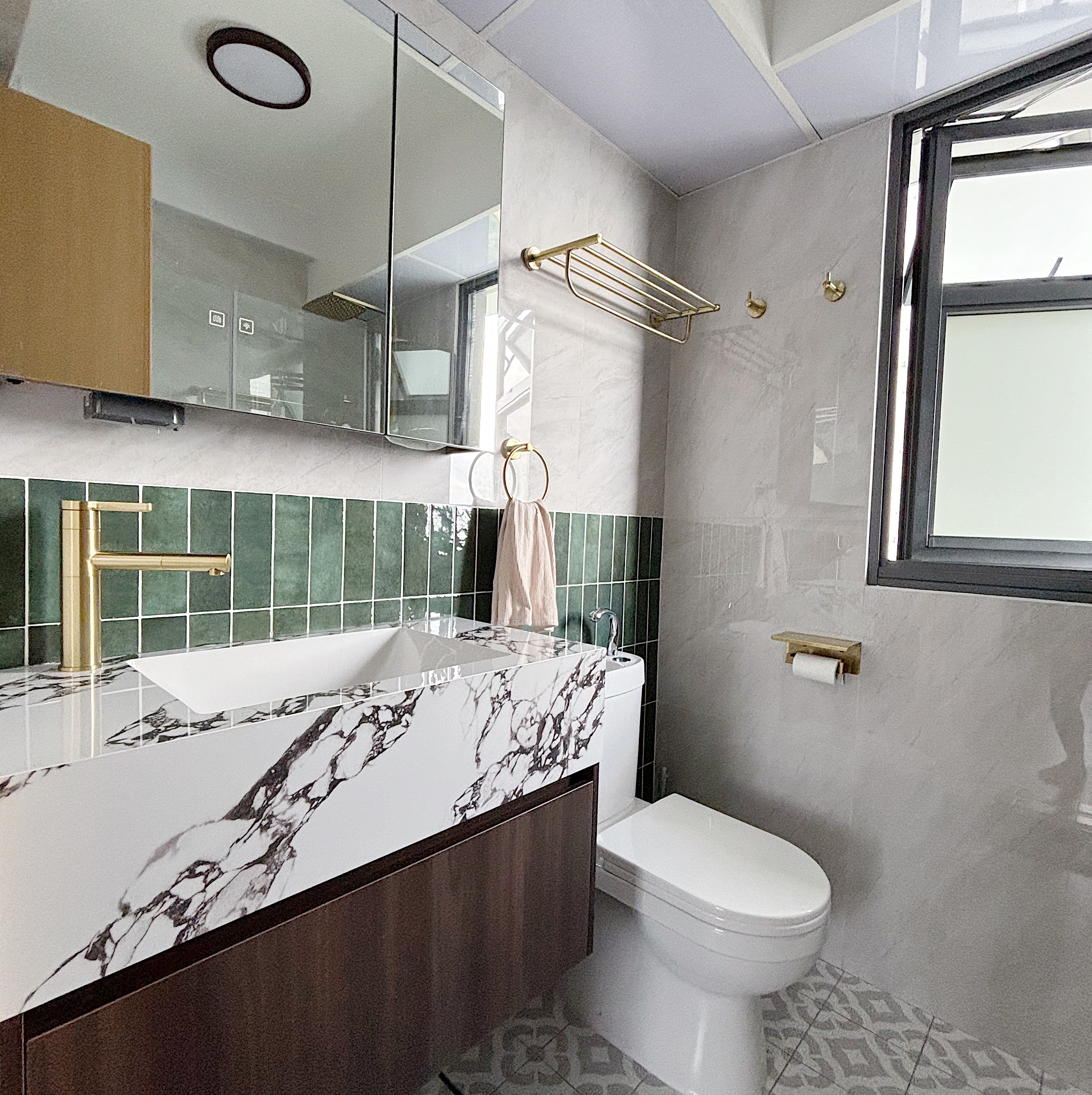Building our dream Modern Farmhouse bathroom - Modern bathroom with sleek design, green and white tiles, marble countertop