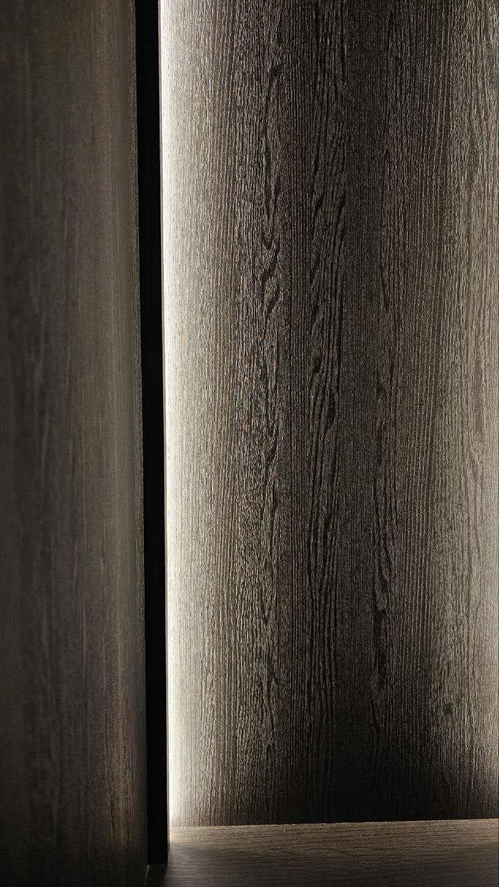 Simple Bedroom for us and the Sandman - Wooden panel, vertical grooves, natural texture, dark wood, rustic charm, elegant