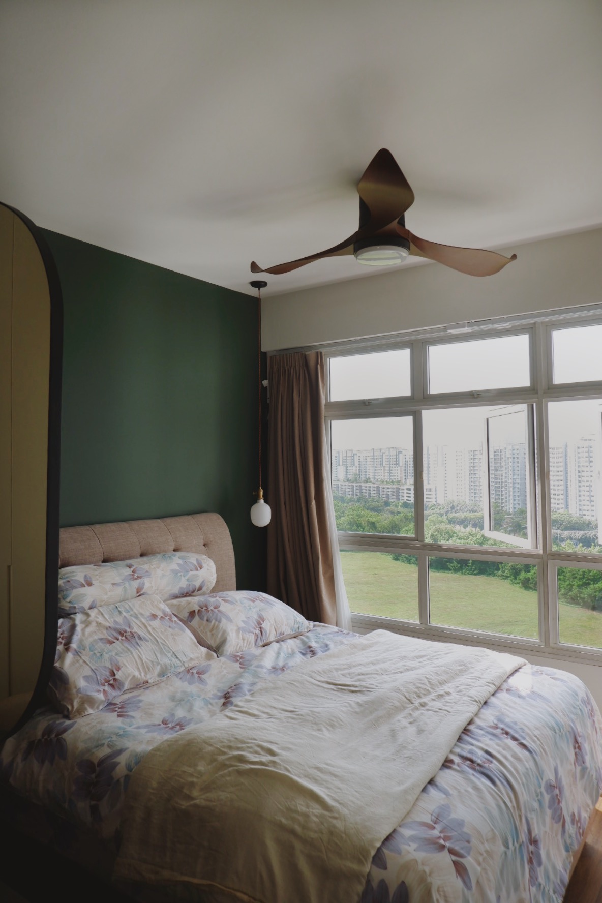 Our Bedroom: Can't get any bed-ter than this  - Green wall, ceiling fan, beige headboard, floral bedspread, large window