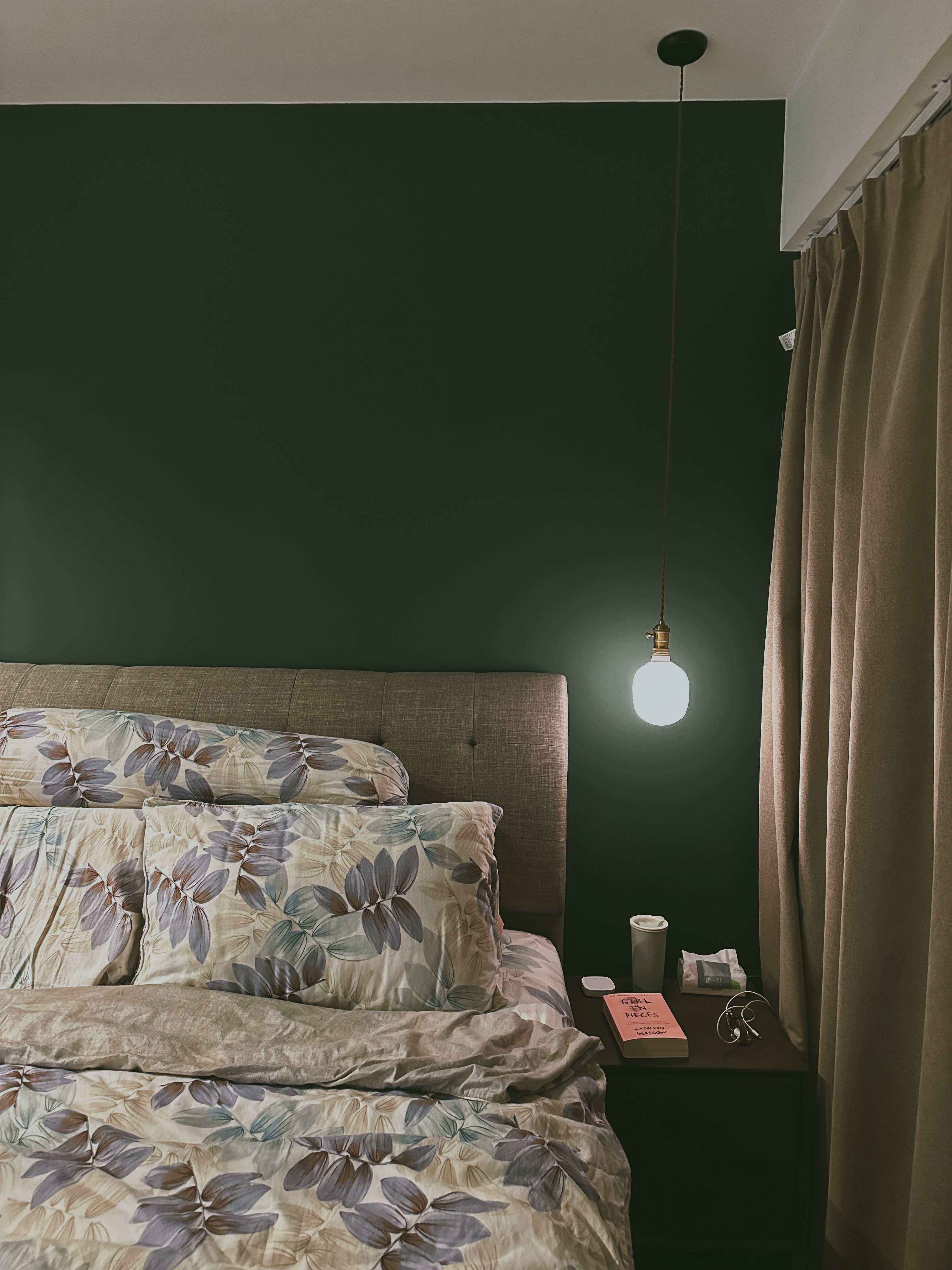 Our Bedroom: Can't get any bed-ter than this  - Floral-patterned bedding, brown upholstered headboard, pendant light fixture