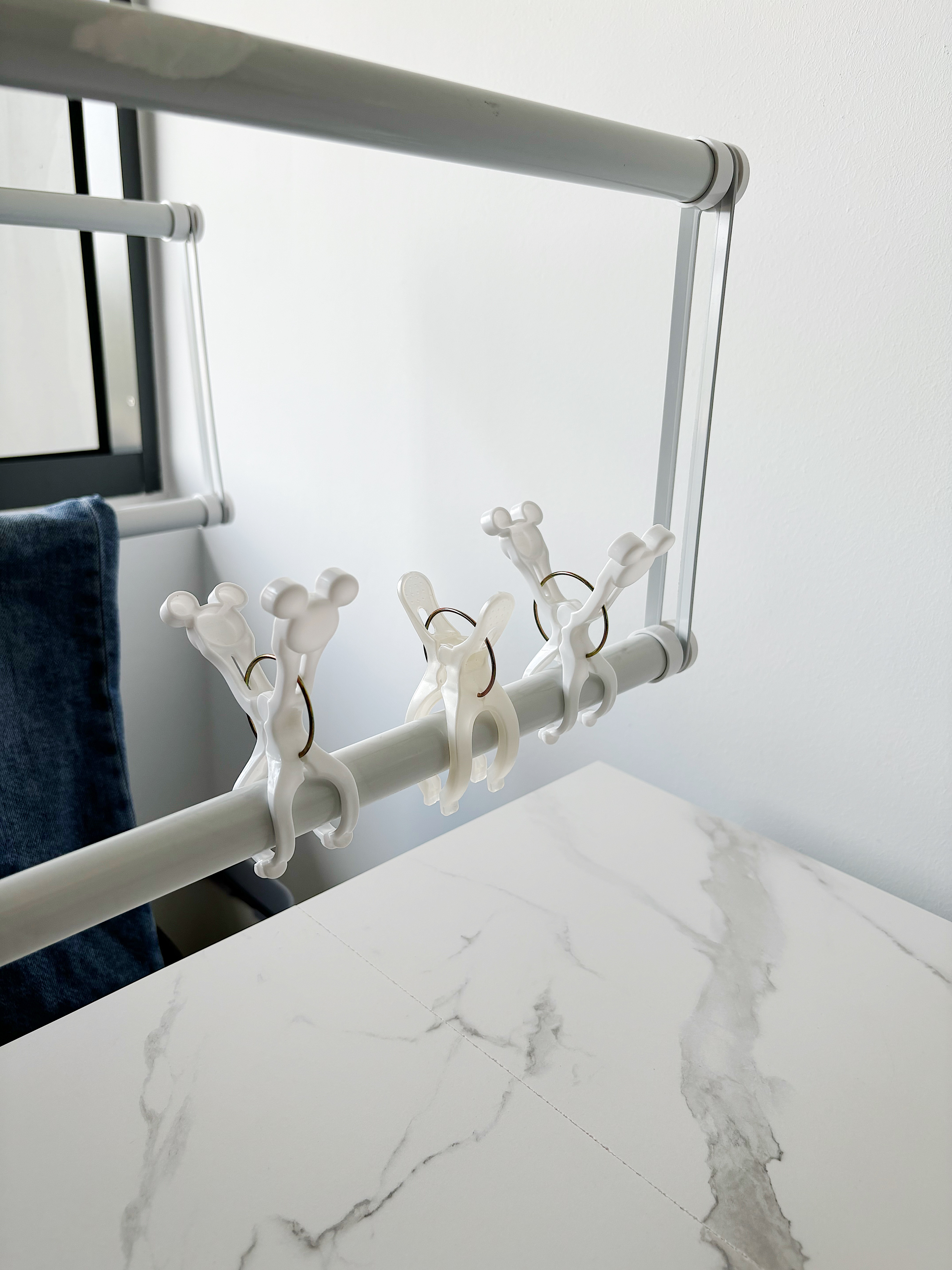 Our clean and organised service yard! - White metal bed rail with decorative handles, white marble table surface, gray marble