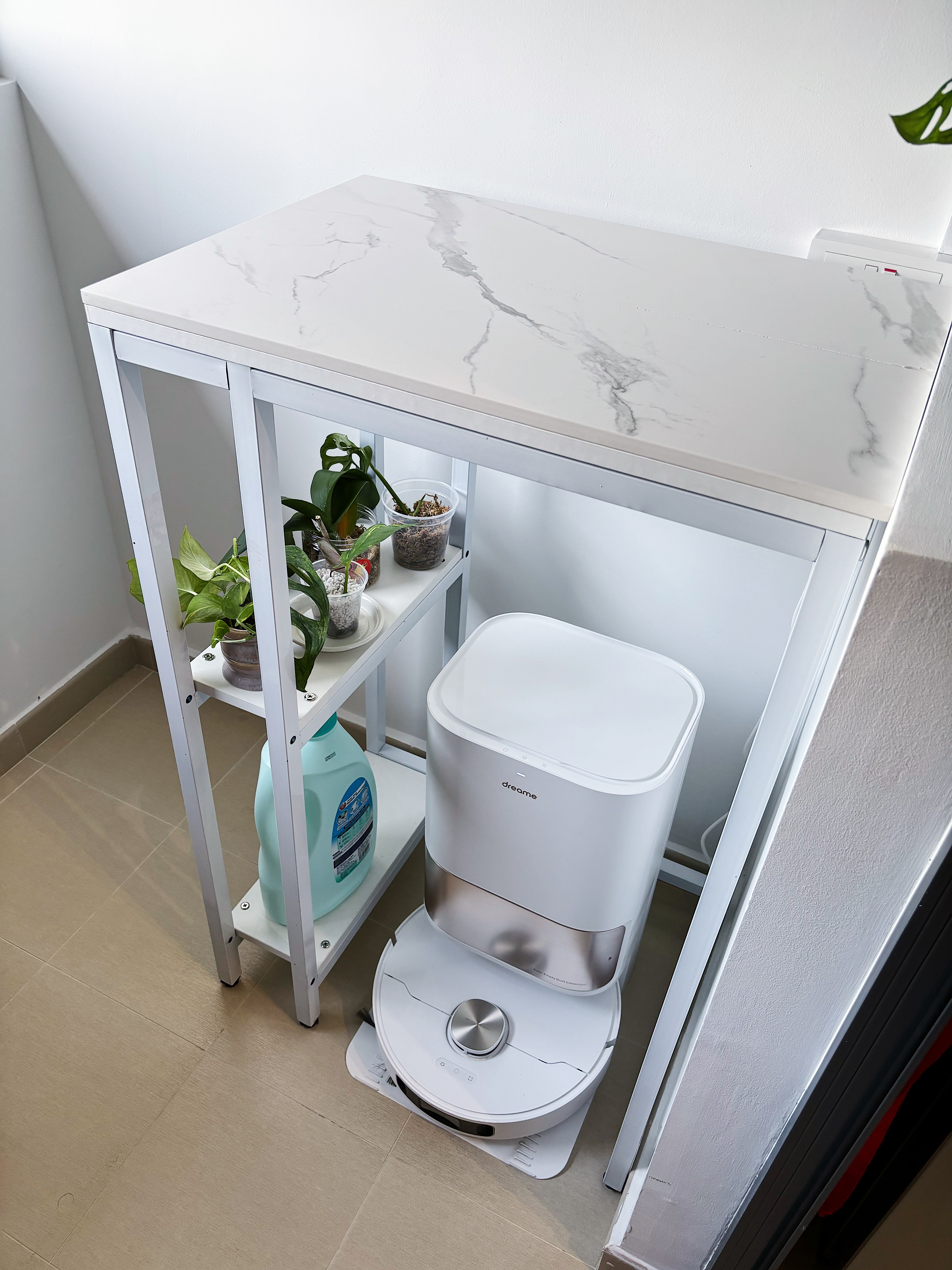 Our clean and organised service yard! - White marble countertop, modern bathroom, white toilet, white toilet paper holder