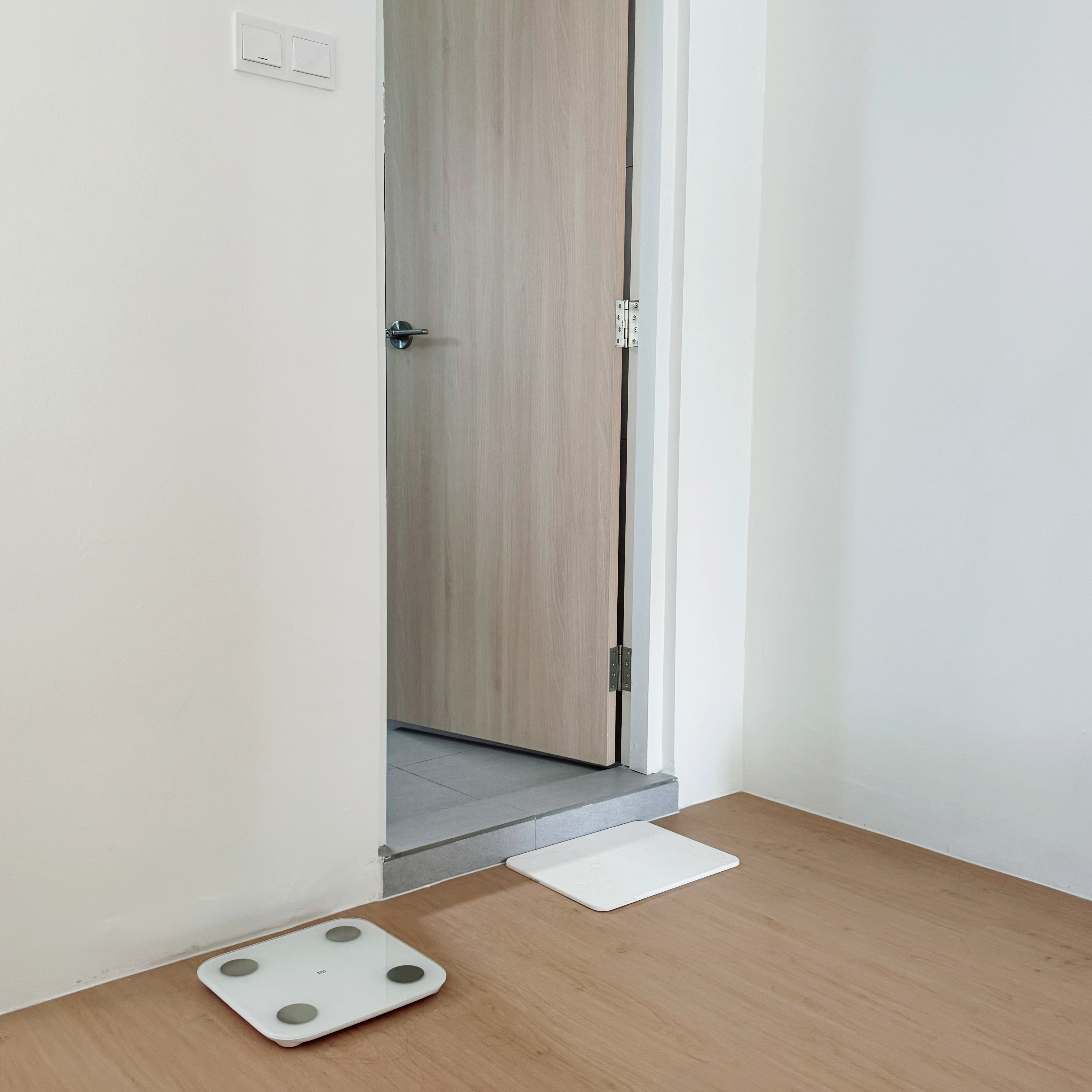 Peek into the tofus' recharging station! 💤  - Wooden door, white wall, minimalist design, modern interior, small room