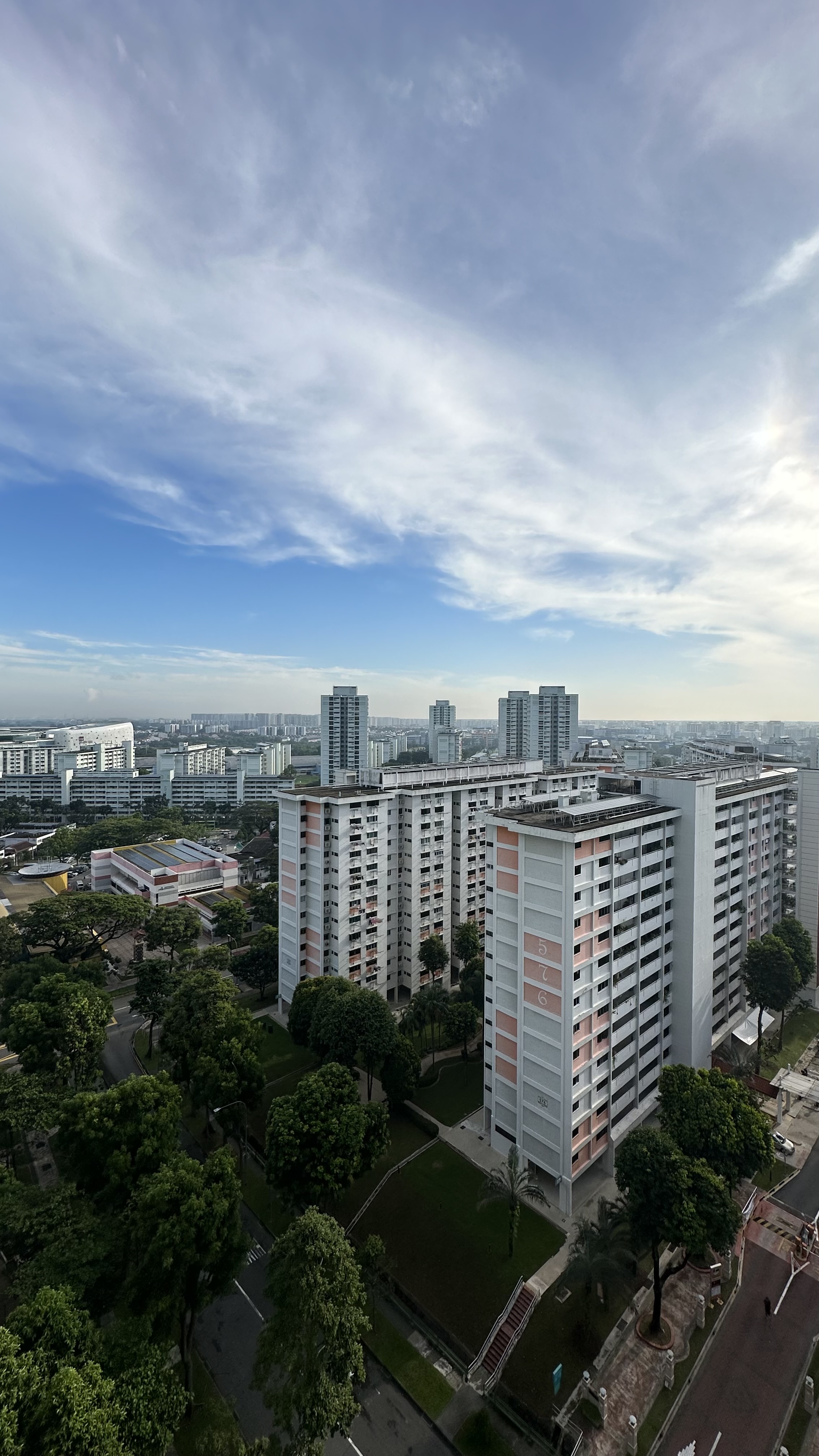 Our Bedroom: A Place Where We Can Check Out the Mood of the Sky - High-rise residential buildings with pink and white