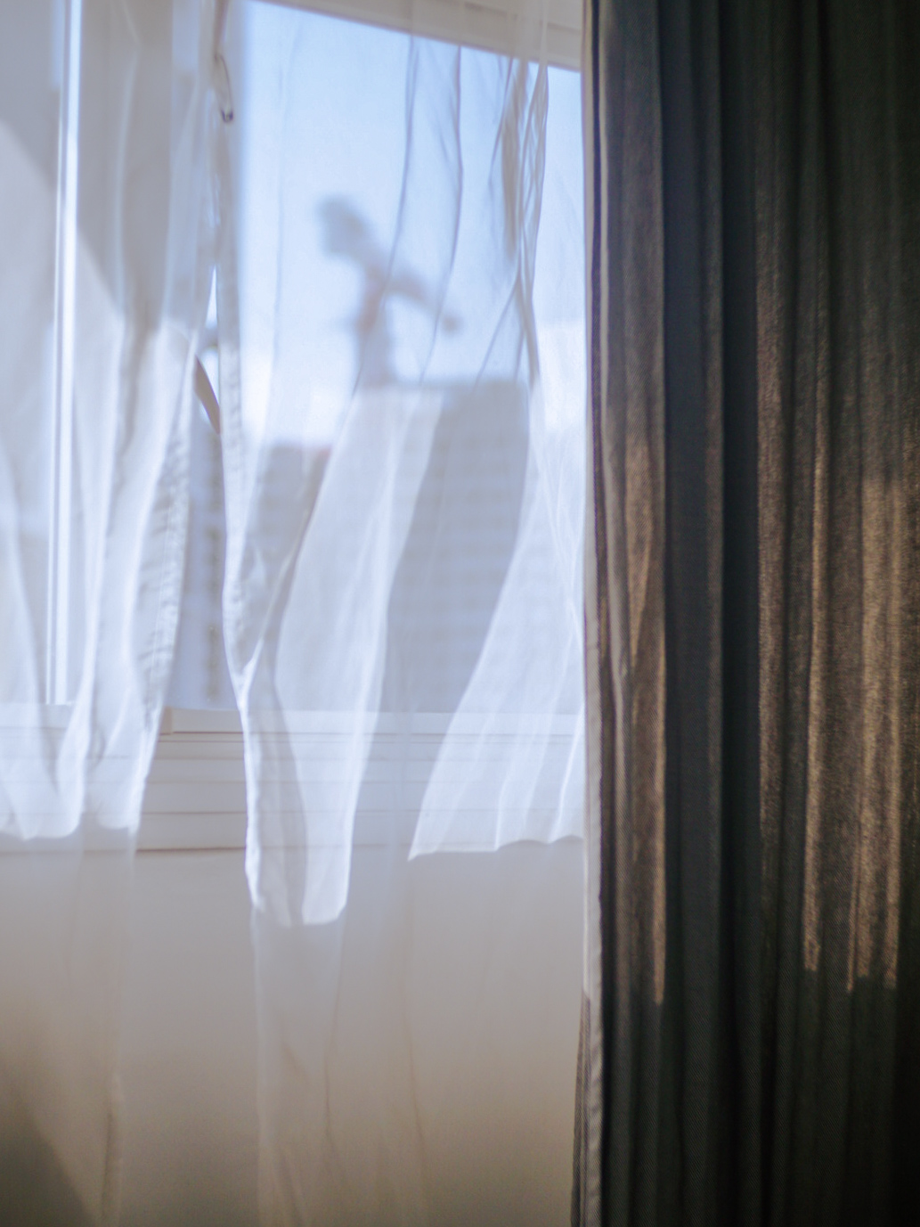 Our Bedroom With No Built-In Cabinets - White sheer curtains, sunlight streaming through, blurred window, soft shadows, light
