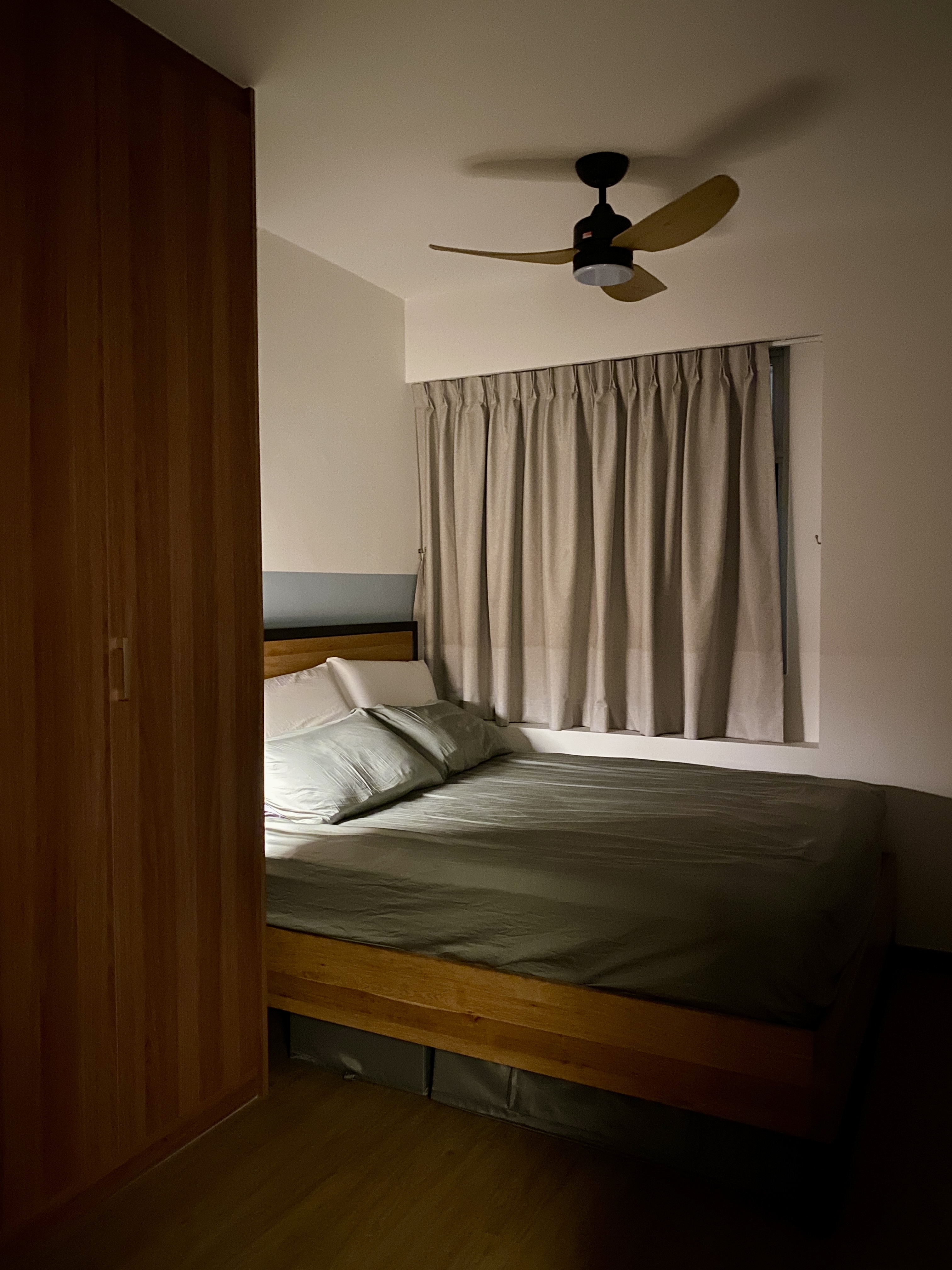 Our Restful Haven: Comfy Bed, Blackout Curtains and Ambient Light - Wooden-framed doorway, ceiling fan, beige curtains