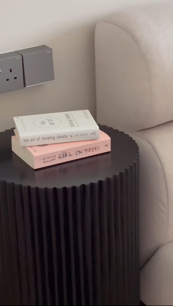 Our Bedroom: Designed for a good night sleep - Modern living room setting with a minimalist design., Two books stacked on a