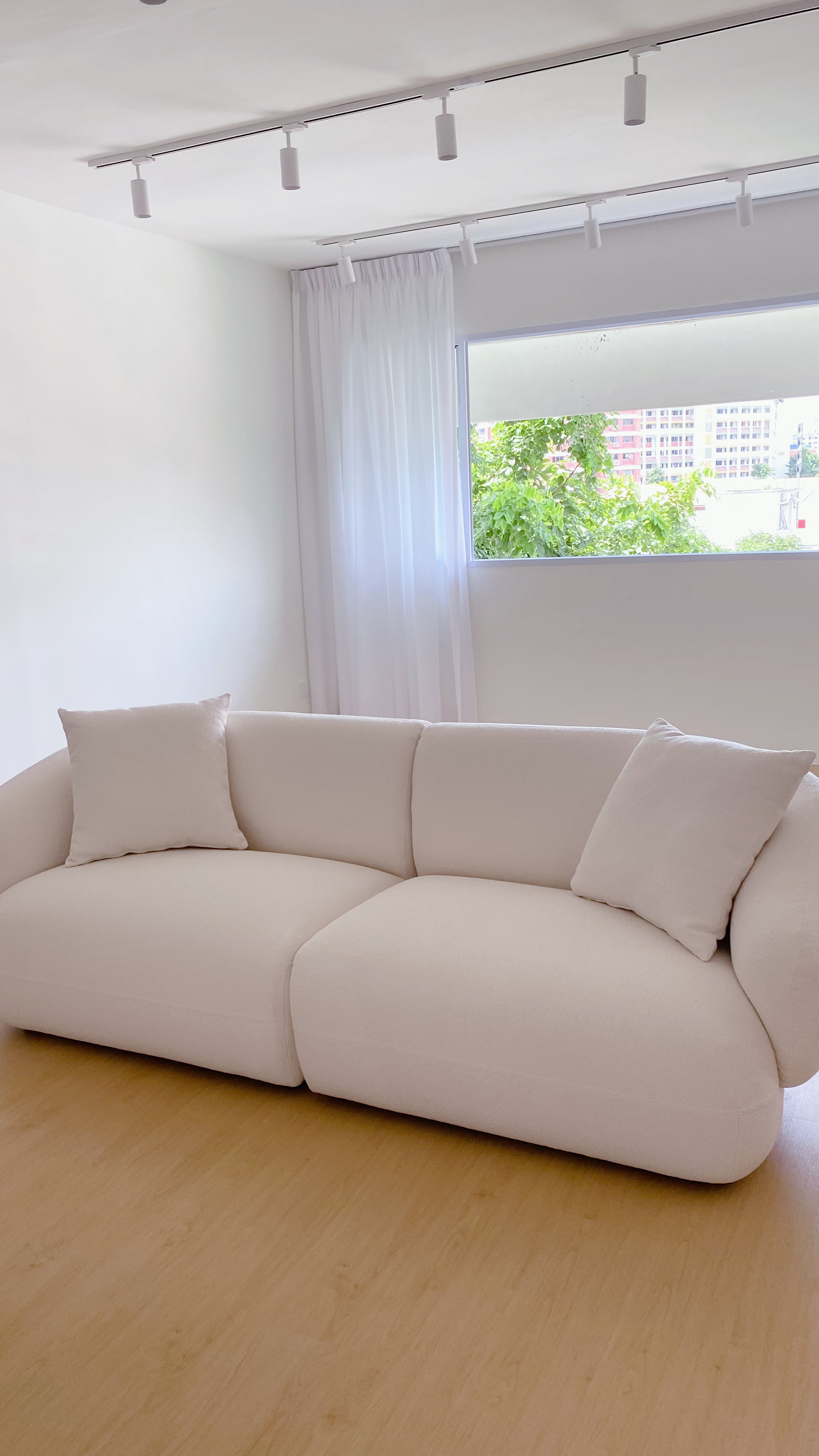 Living with restrictions: the tofu edition - White minimalist living room, modern furniture, beige sectional sofa, natural
