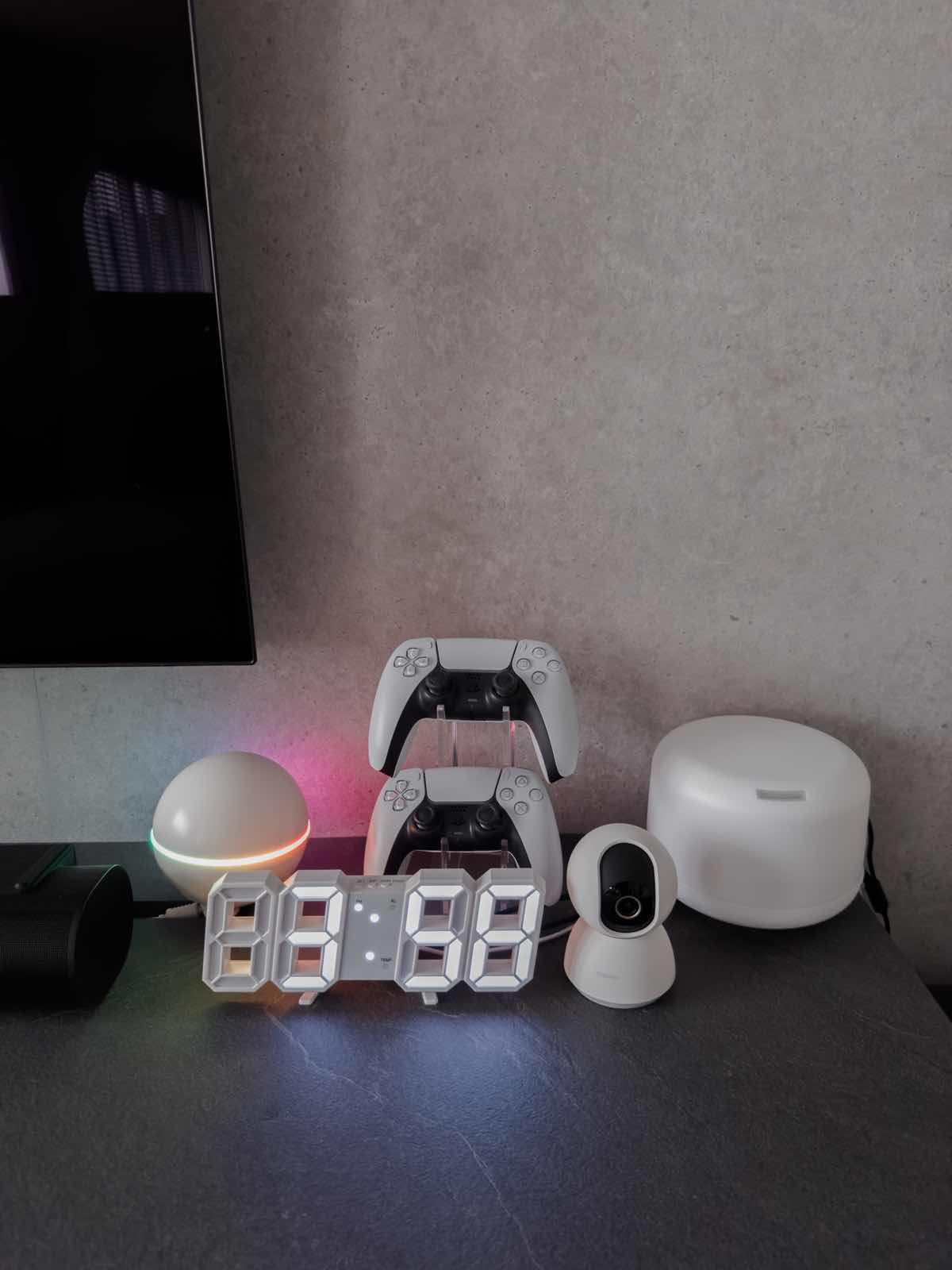 Creating the Ultimate Comfort Haven: A Closer Look at My Living Room - Smart home devices on desk, Gaming console and