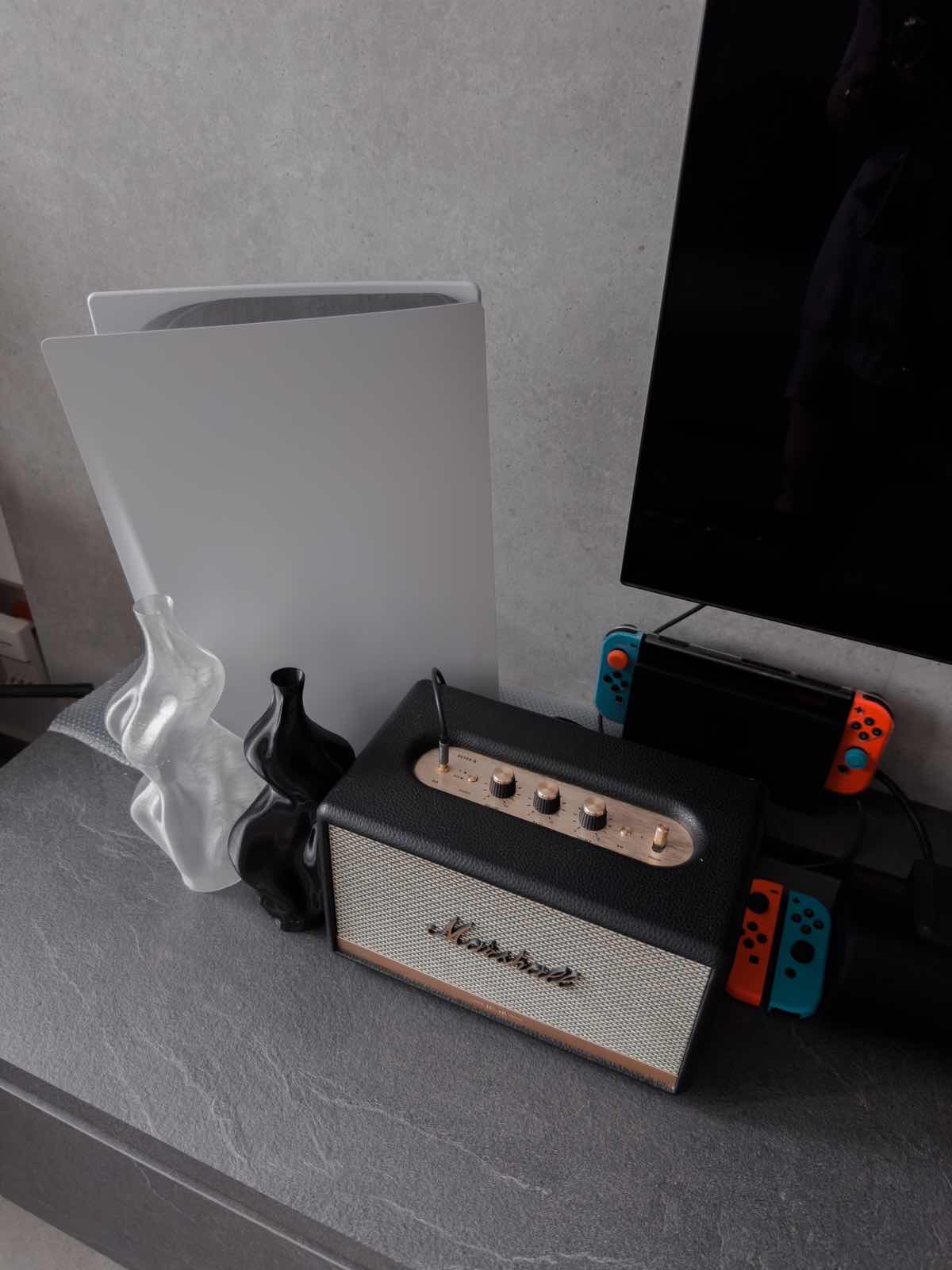 Creating the Ultimate Comfort Haven: A Closer Look at My Living Room - Guitar amplifier, black and silver design, textured