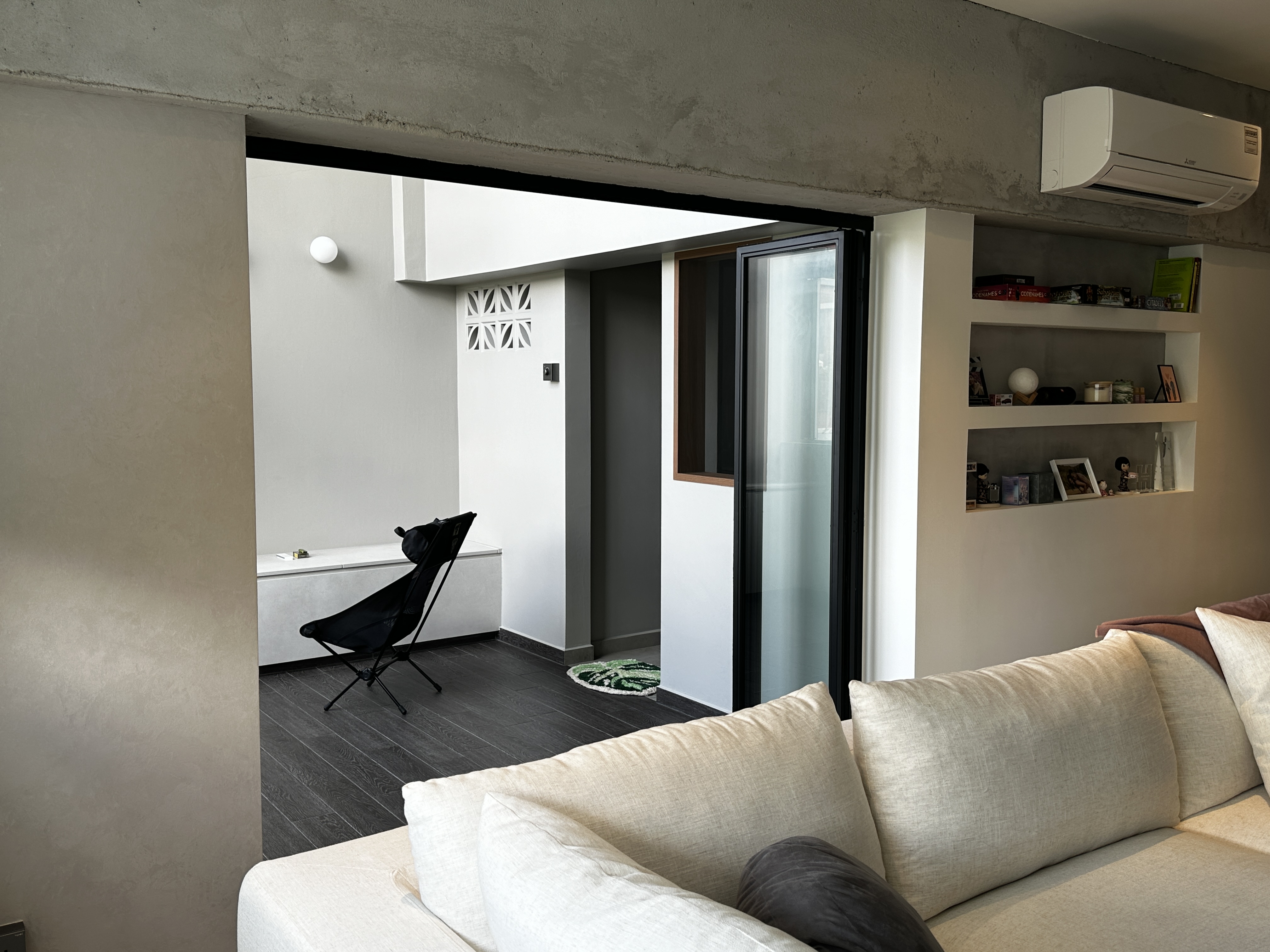 Living Room: Our Oasis with no built-in! - Modern minimalist living room, sleek white air conditioner, open-concept design