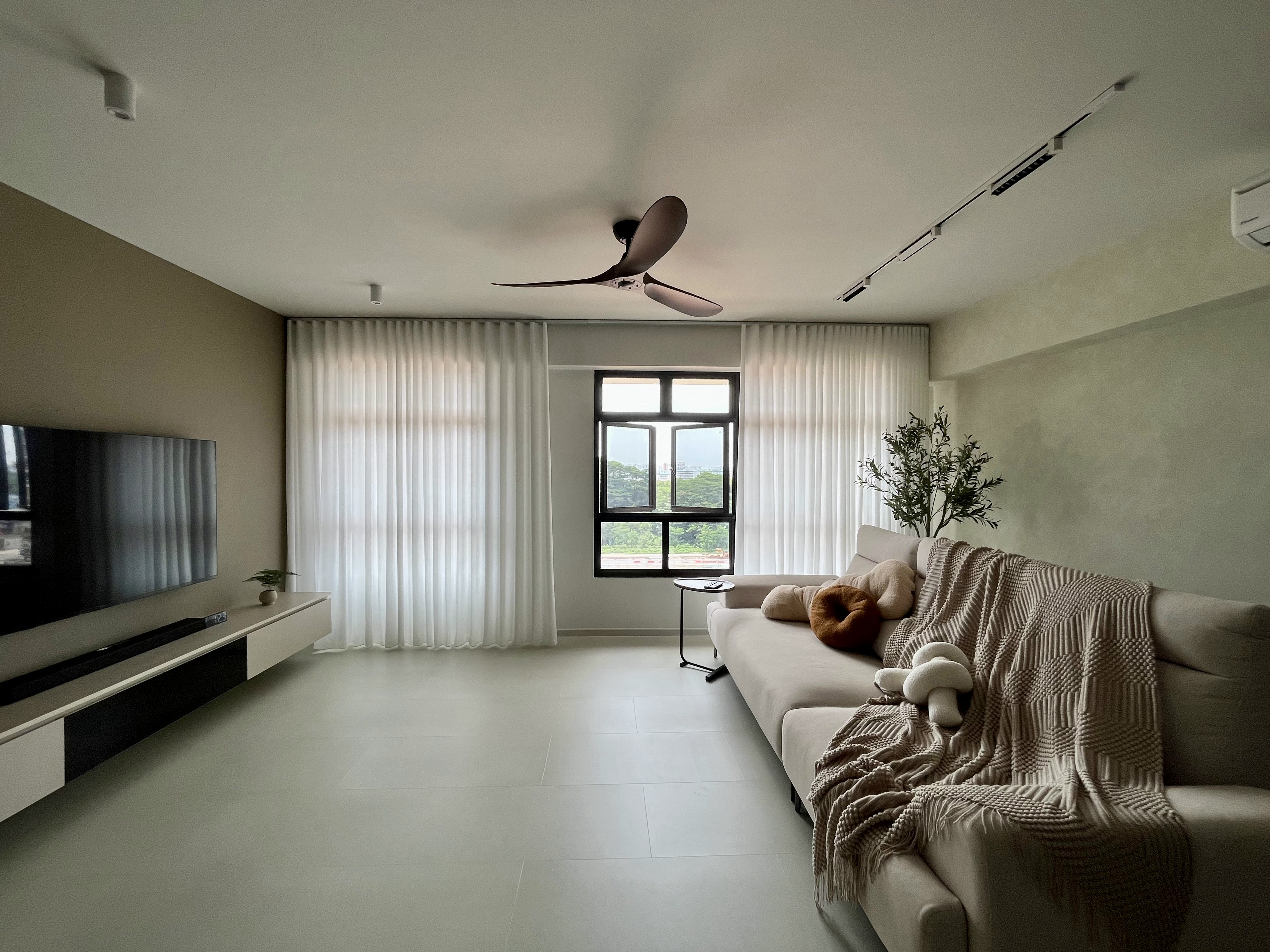 Welcome Home: A "Sand-sory" Escape - Modern living room with sleek design, minimalist decor, large window with white