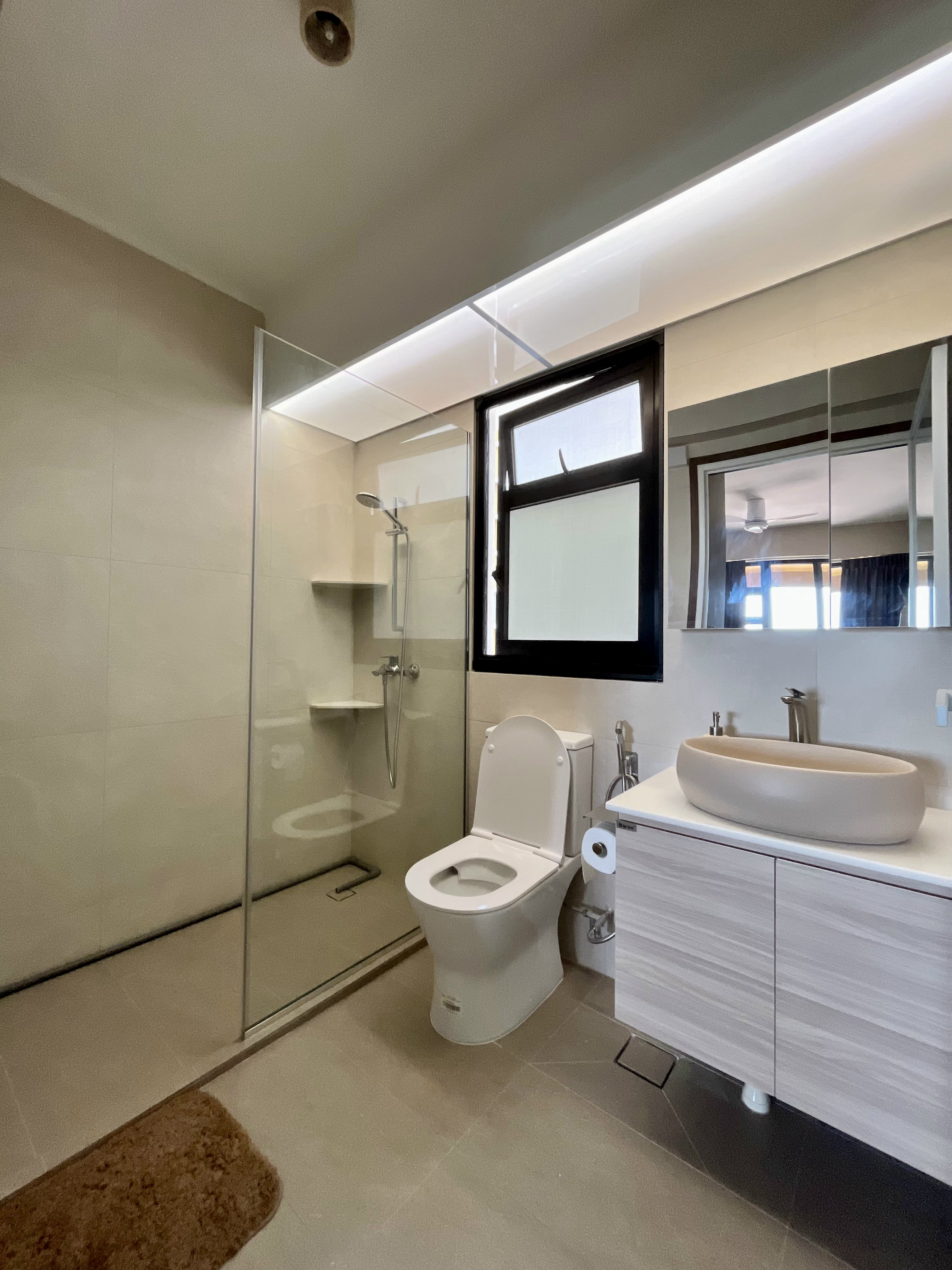 Welcome Home: A "Sand-sory" Escape - Modern minimalist bathroom, sleek design, large mirror, built-in sink, glass shower