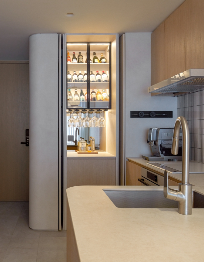 Dining area: A Ryokan inspired space where we work, dine and chill  - Modern kitchen with open refrigerator, wine bottles