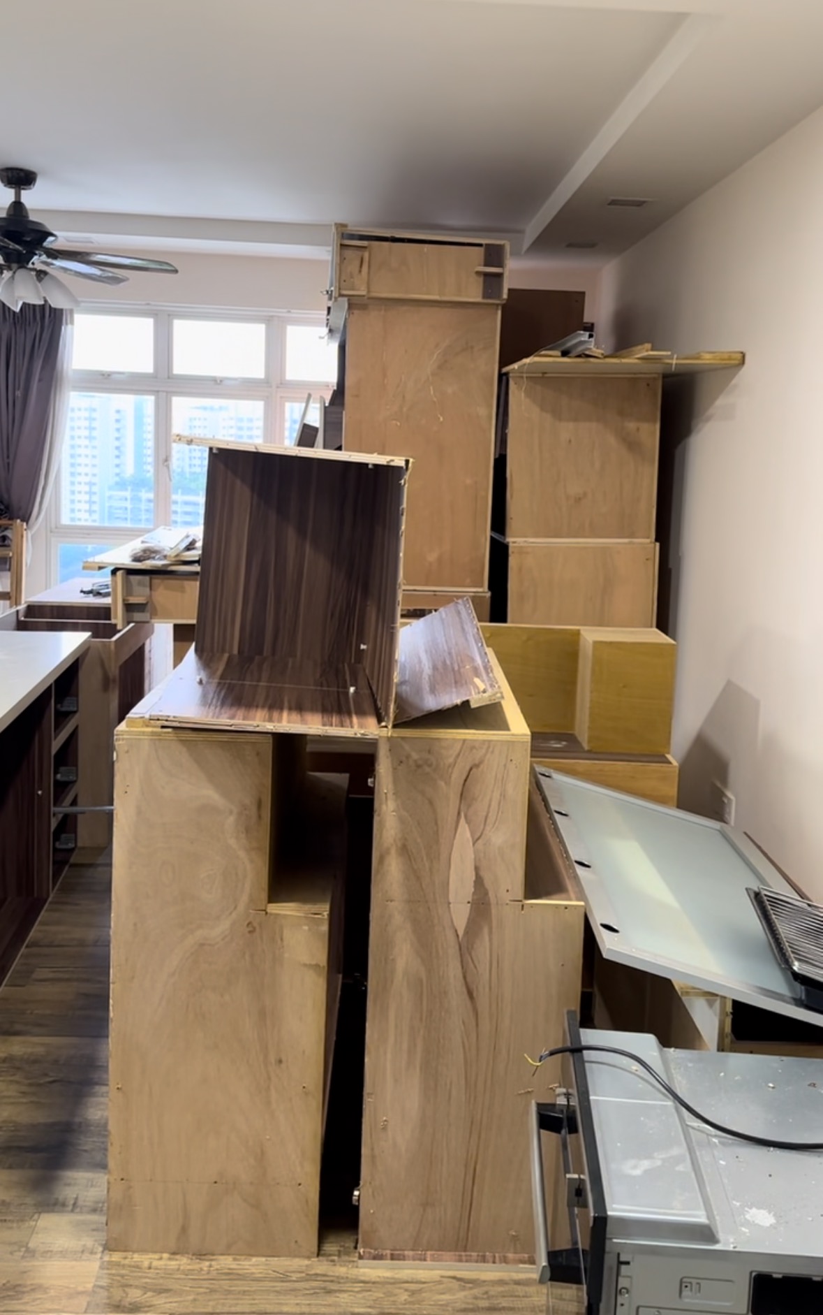 Our renovation journey as 2 "broke" newlyweds - Wooden boxes, construction site, unfinished room, wooden cabinets, wooden