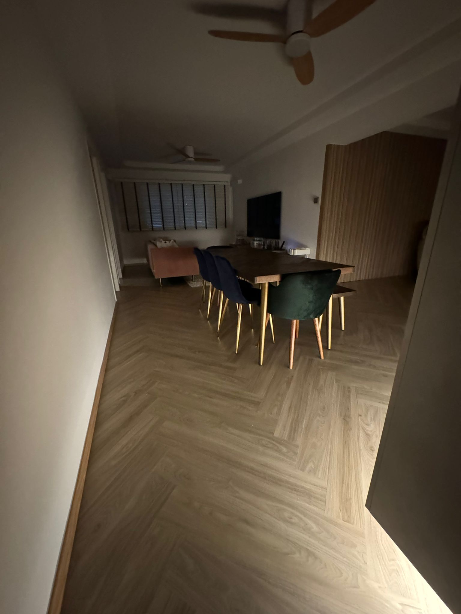 Dreams turned into reality - Wooden dining table, modern chairs, herringbone pattern flooring, ceiling fan, recessed