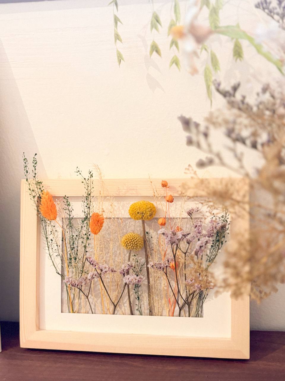 3 Real and 2 Fakes - Our Green-ish Corner - vibrant botanical arrangement, soft-focus background, pastel color palette