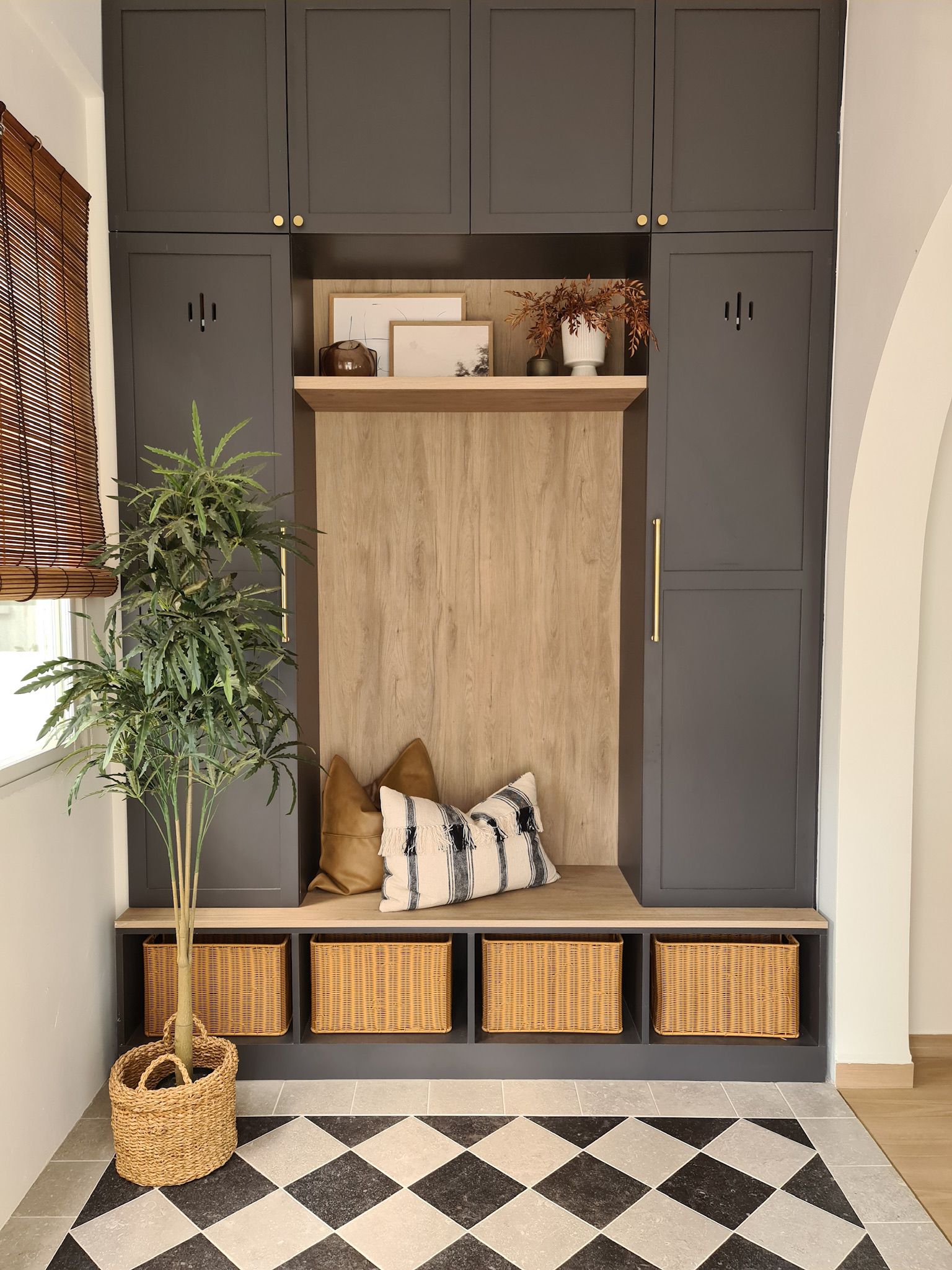 Creating a calming space with plants - modern storage cabinet, dark gray cabinets, wooden shelf, indoor plant, wicker
