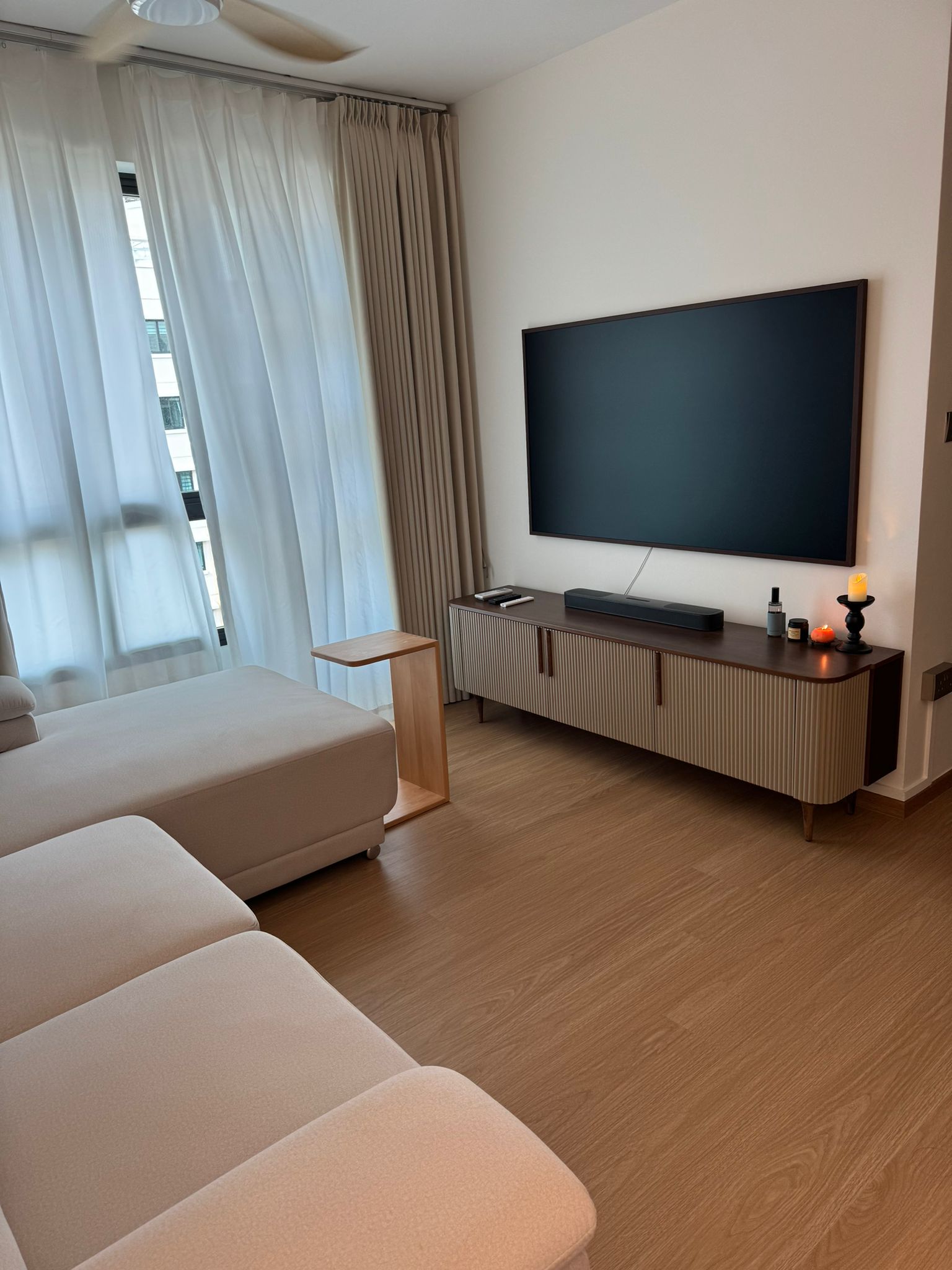 Serenity Living Room: Soft Minimalism Beige Decor  - Modern living room, minimalist decor, large flat-screen TV, beige sofa