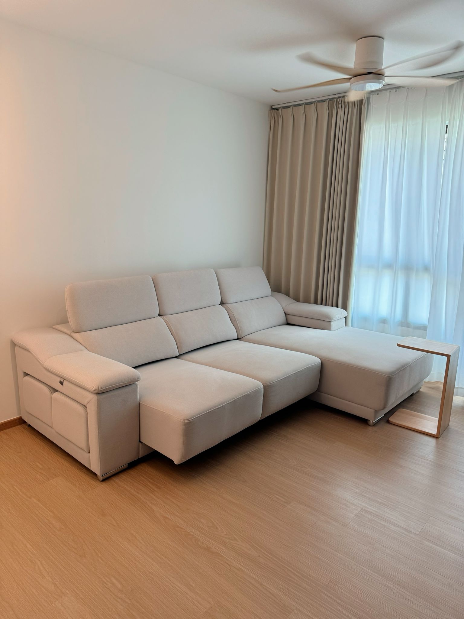 Serenity Living Room: Soft Minimalism Beige Decor  - Modern minimalist living room, beige sectional sofa, light hardwood