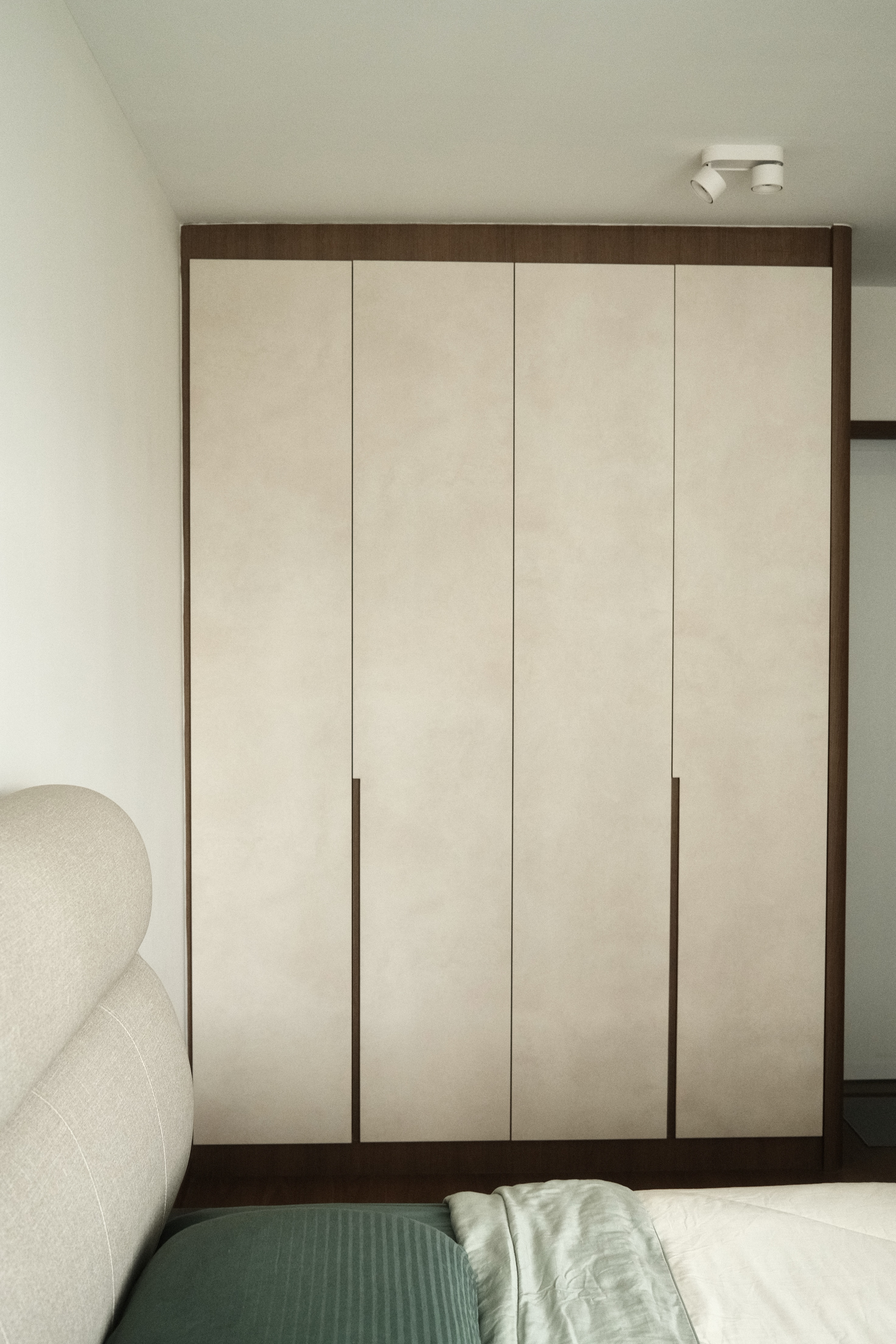 Our serene bedroom with minimal carpentry - Wooden wardrobe with minimalist design, beige color, vertical slats, modern